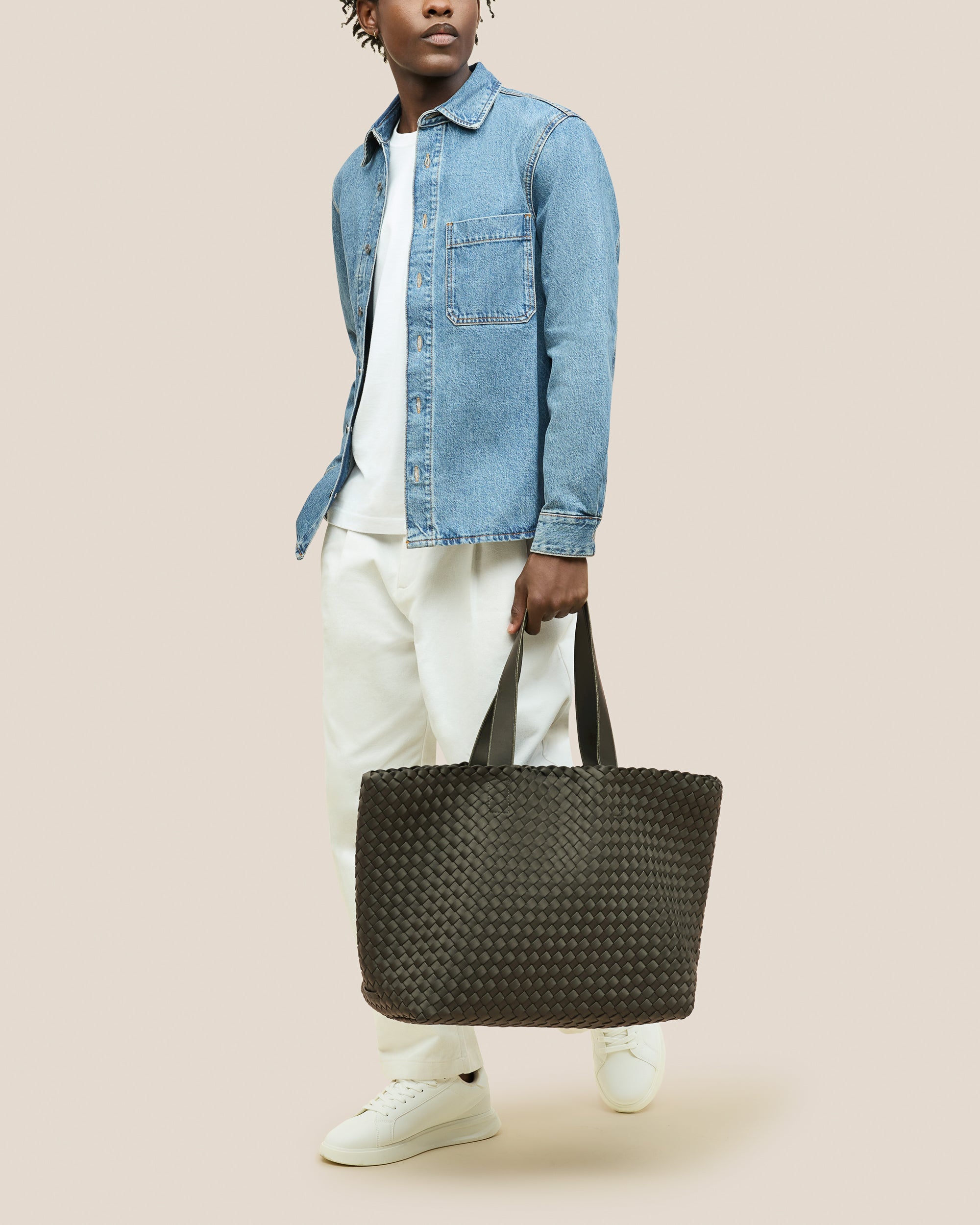 Como Tote in Olive shown on model to illustrate scale and soft silhouette.