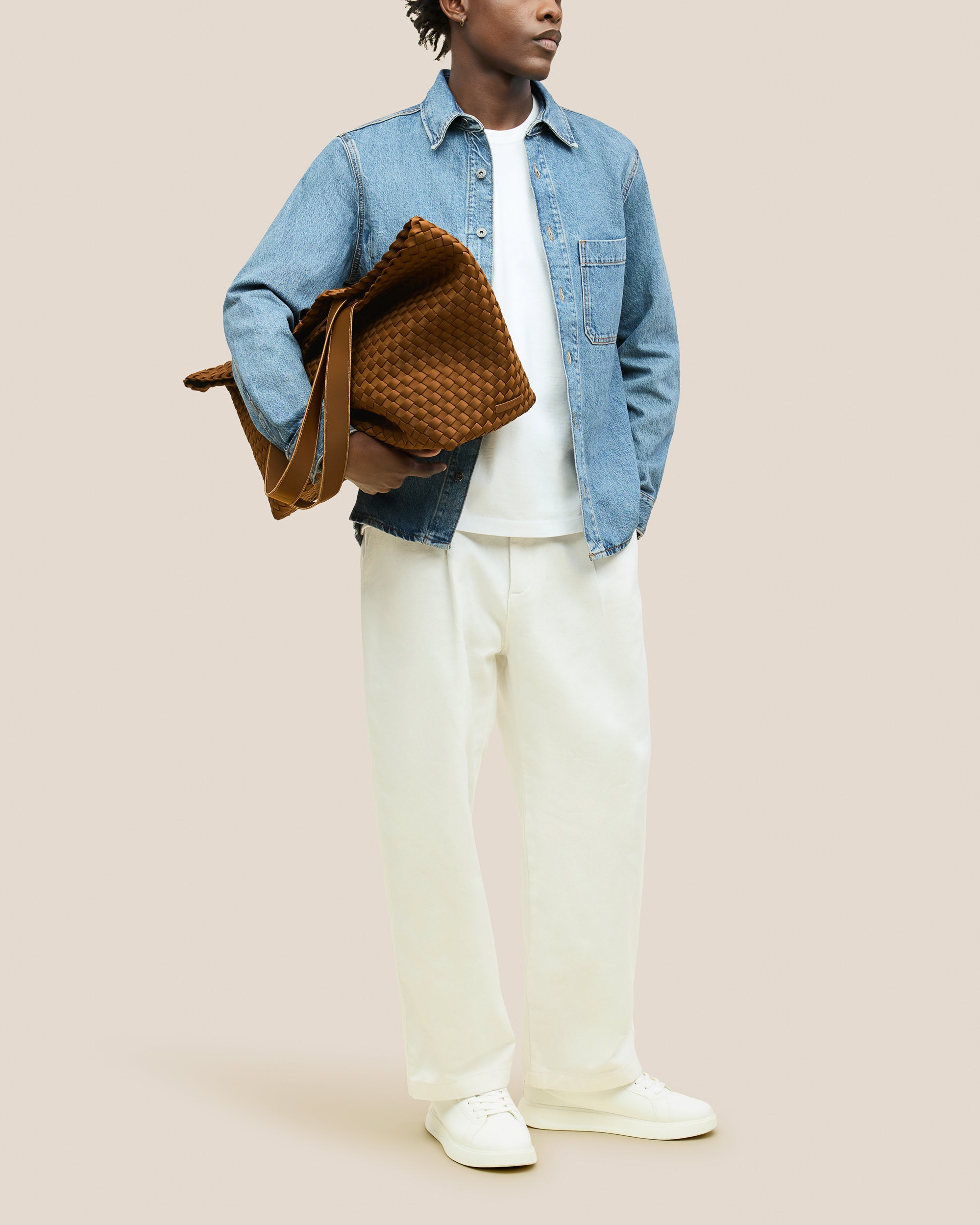 Como Tote in Teak shown on model to illustrate scale and soft silhouette.