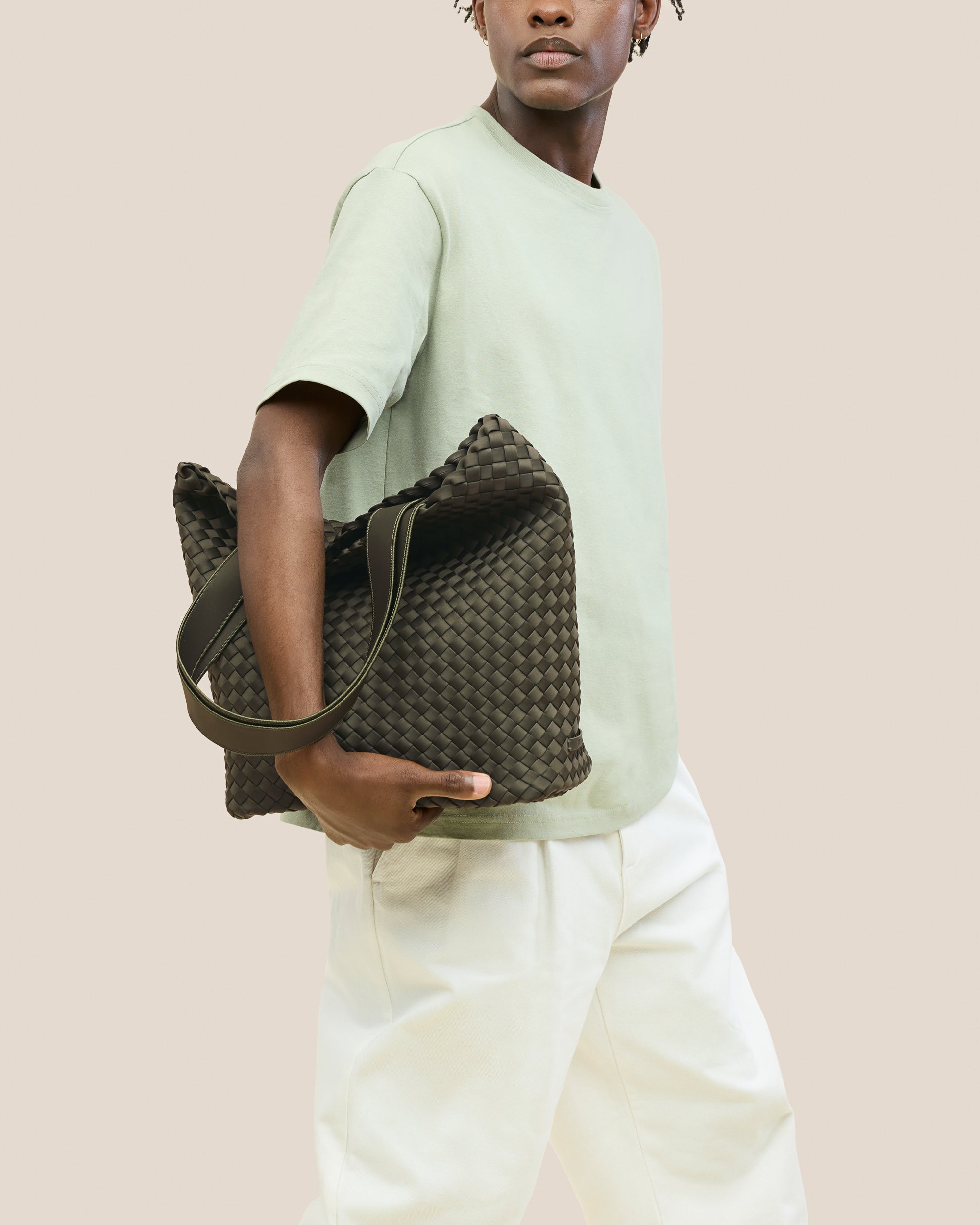 Como Tote in Olive shown on model to illustrate scale and soft silhouette.