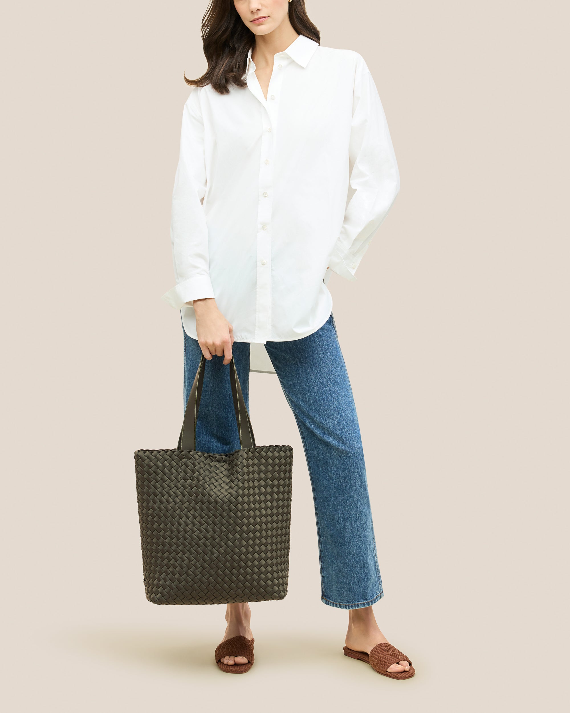 Como Tote in Olive shown on model to illustrate scale and soft silhouette.
