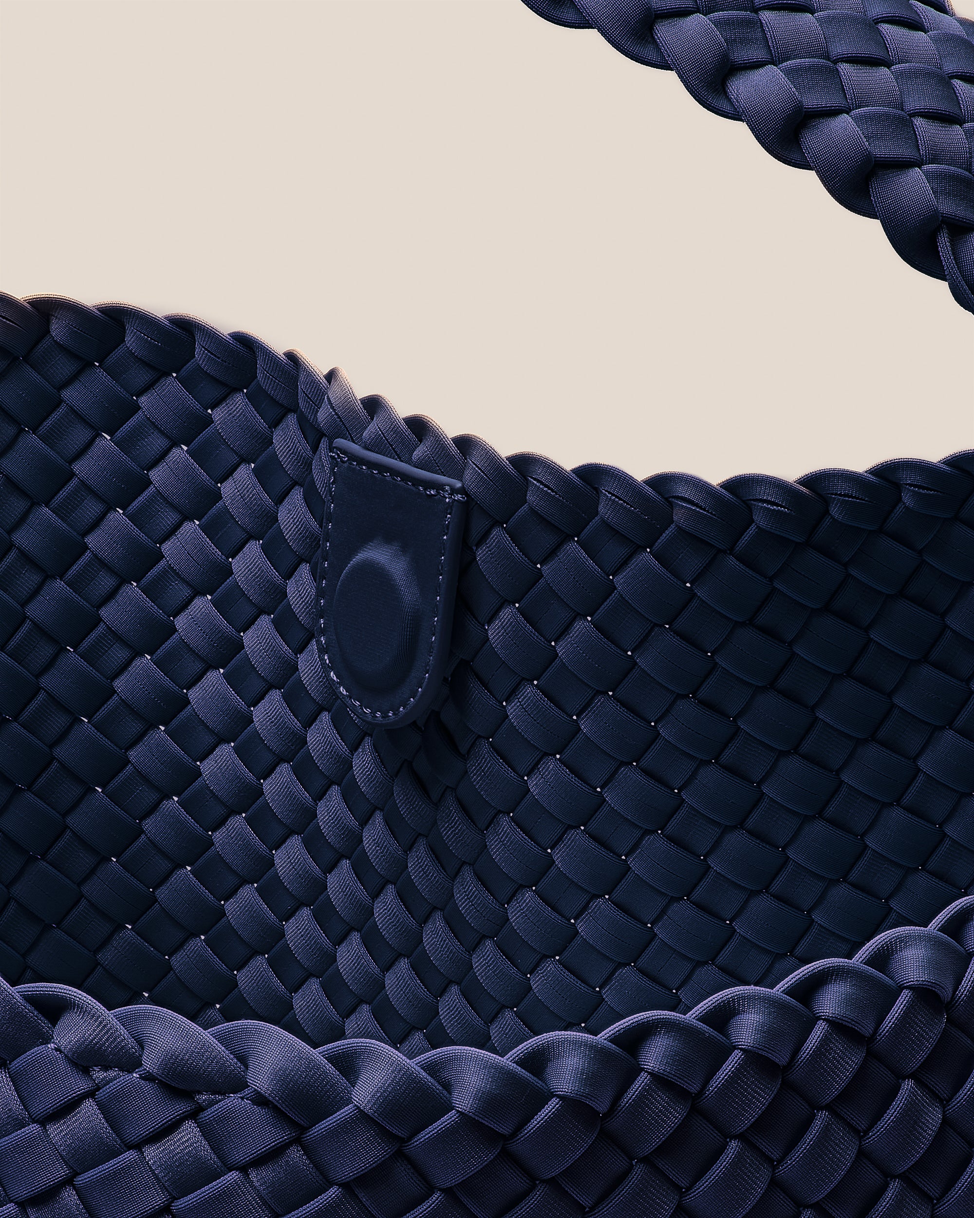 Interior close-up of Nomad Hobo in Ink Blue showing its open top with magnetic snap closure, and unlined interior.