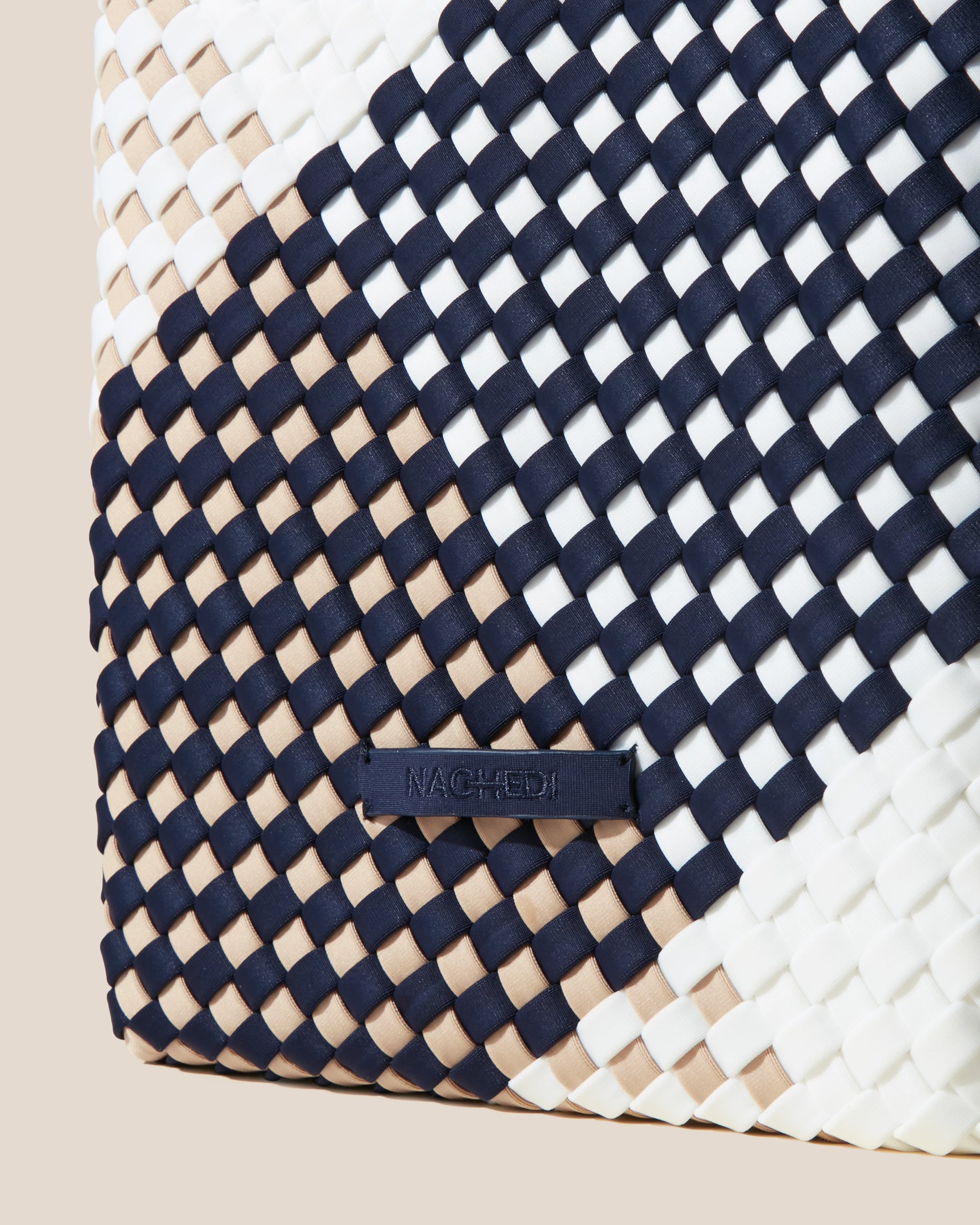 Close-up of stamped NAGHEDI logo on St. Barths Tote in Somerset.