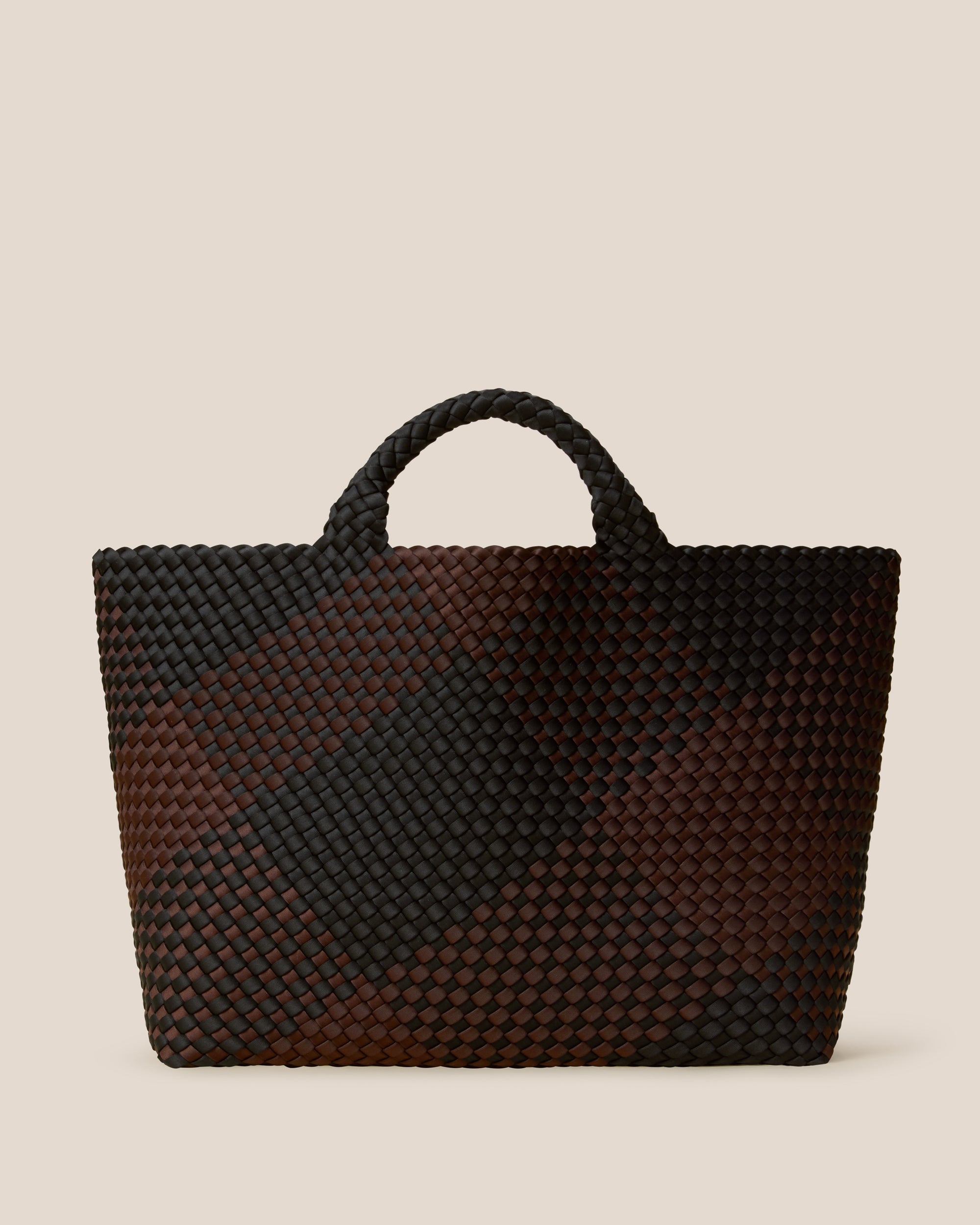 St. Barths Tote in Siena, a dark chocolate brown and true black tone, in handwoven neoprene, featuring an open top, and woven top handles.