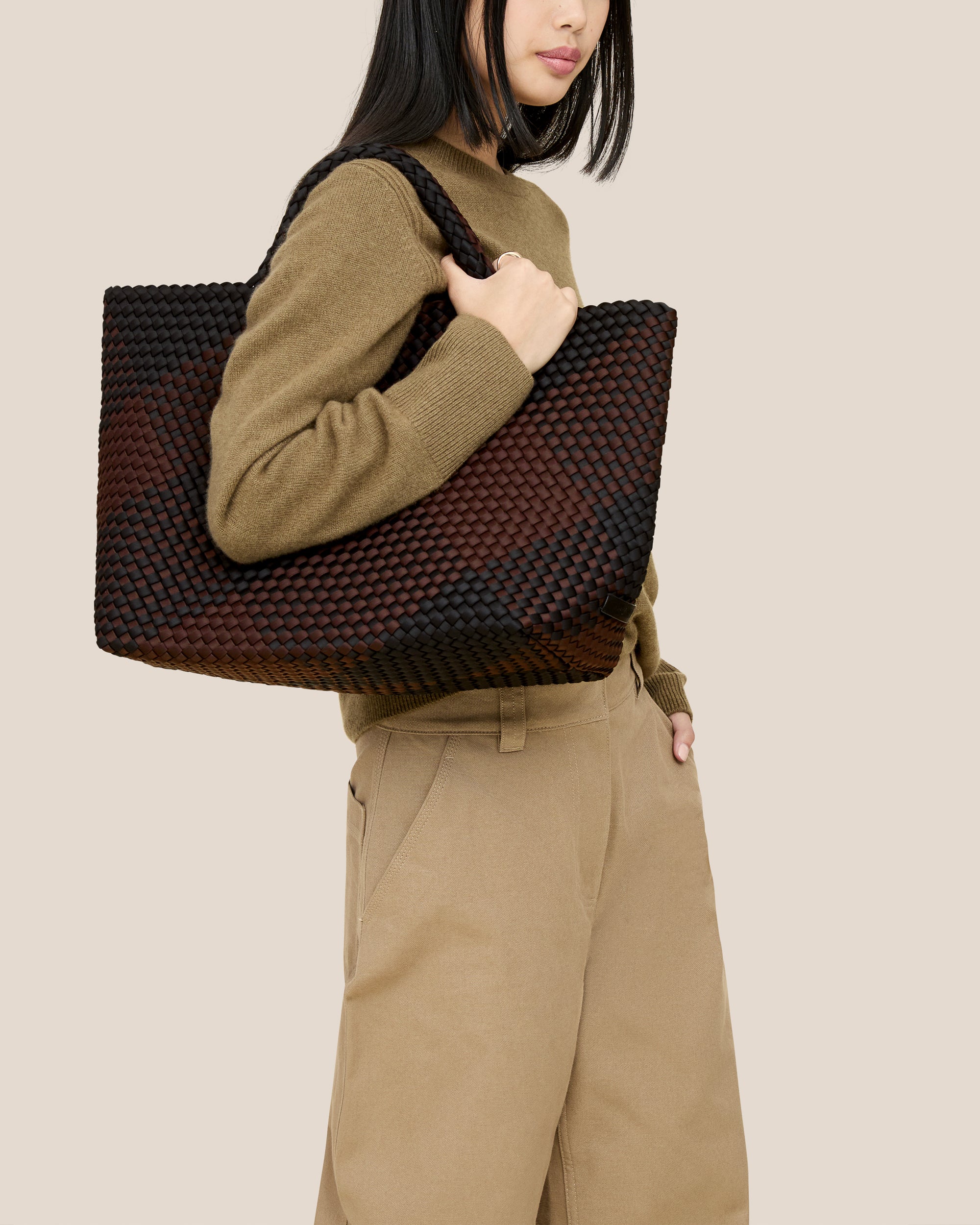 St. Barths Tote in Siena shown on model to illustrate scale and soft silhouette.