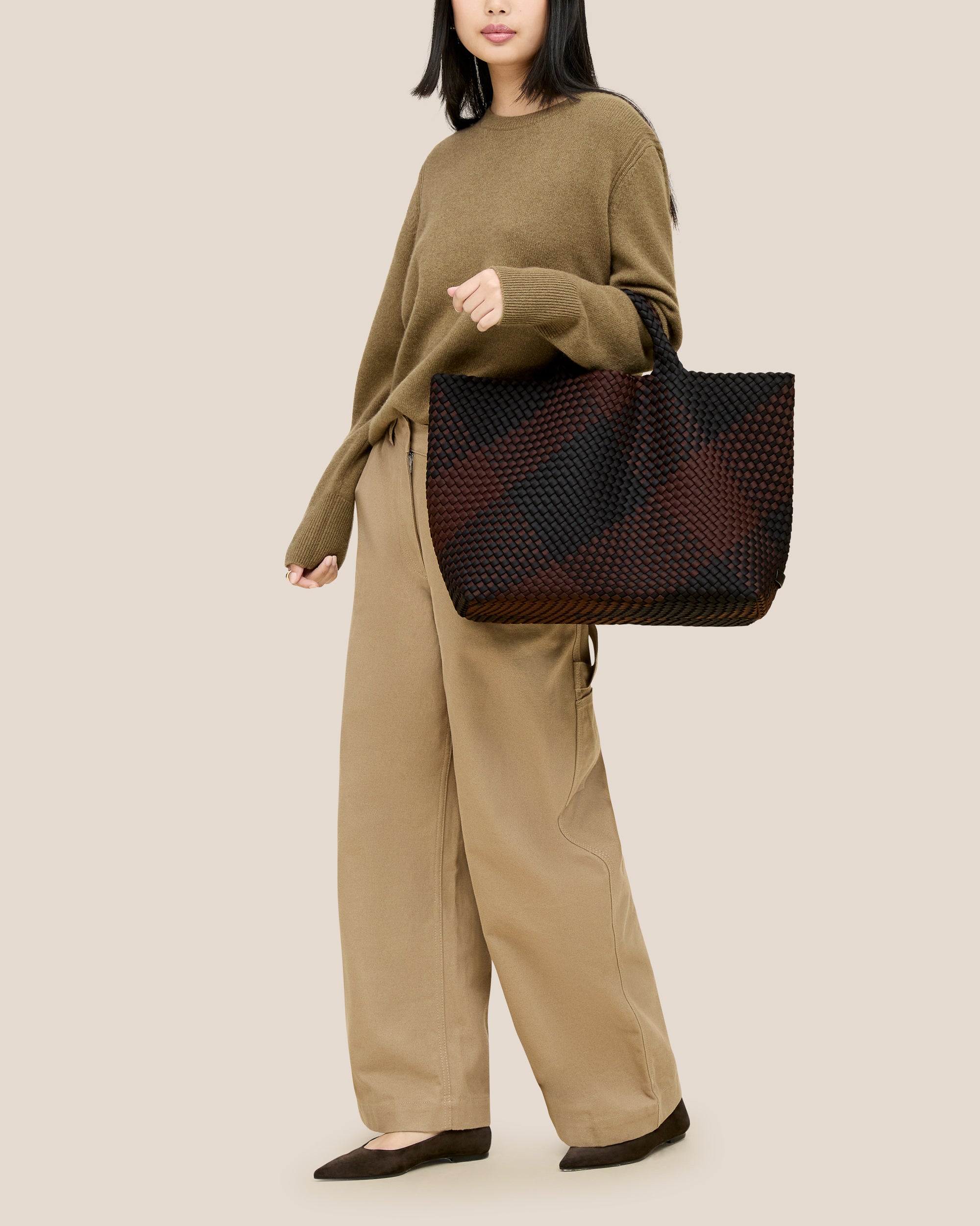 St. Barths Tote in Siena shown on model to illustrate scale and soft silhouette.