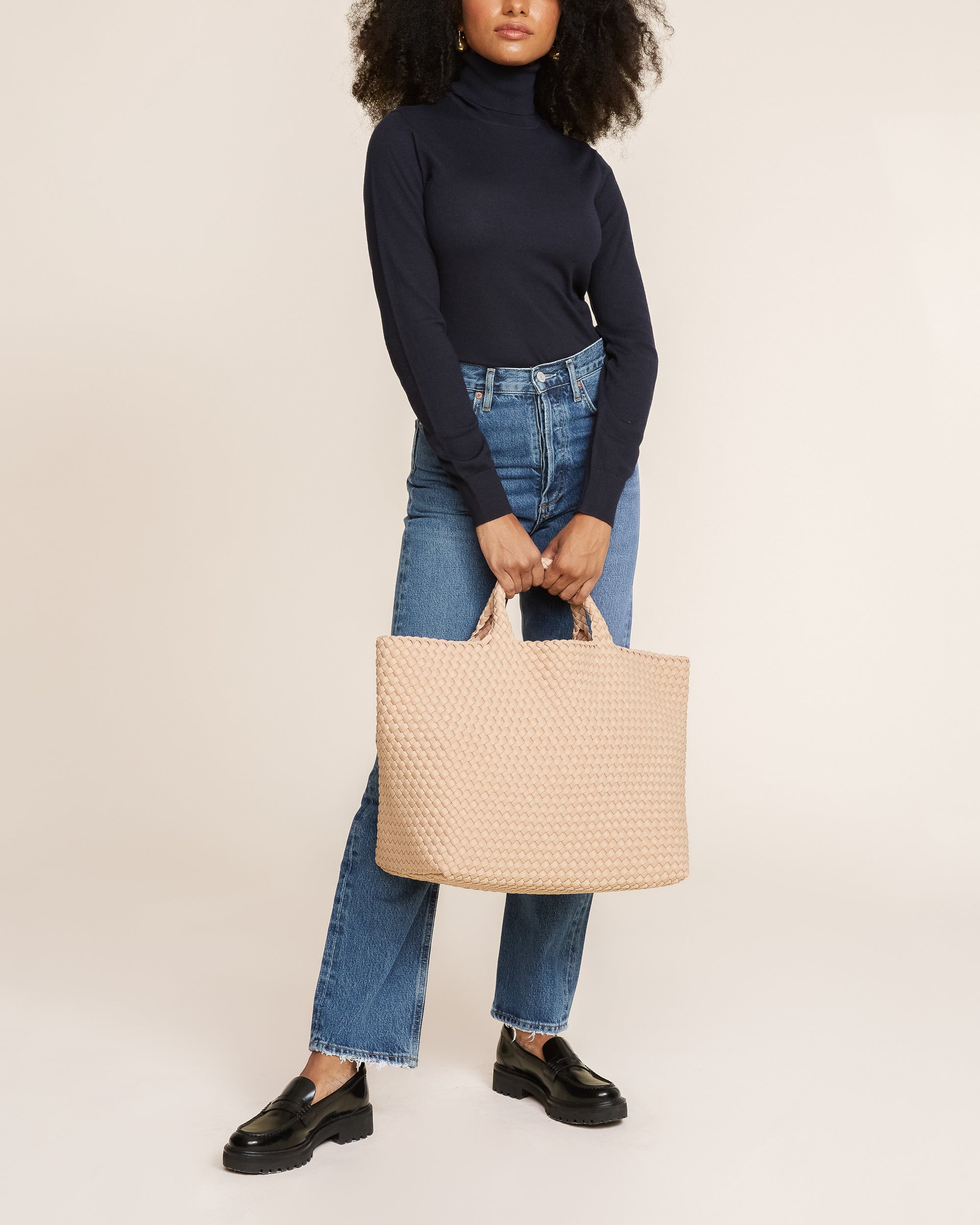 St. Barths Tote in Camel shown on model to illustrate scale and soft silhouette.