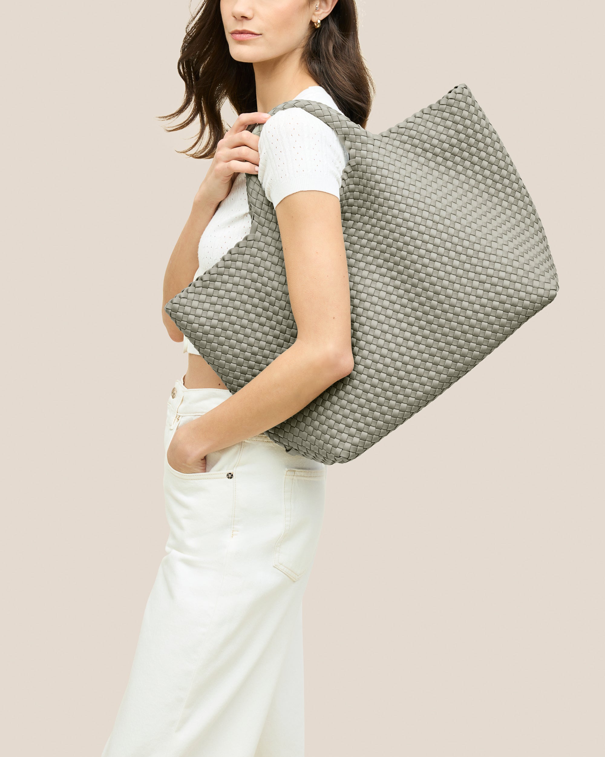 St. Barths Tote in Celadon shown on model to illustrate scale and soft silhouette.