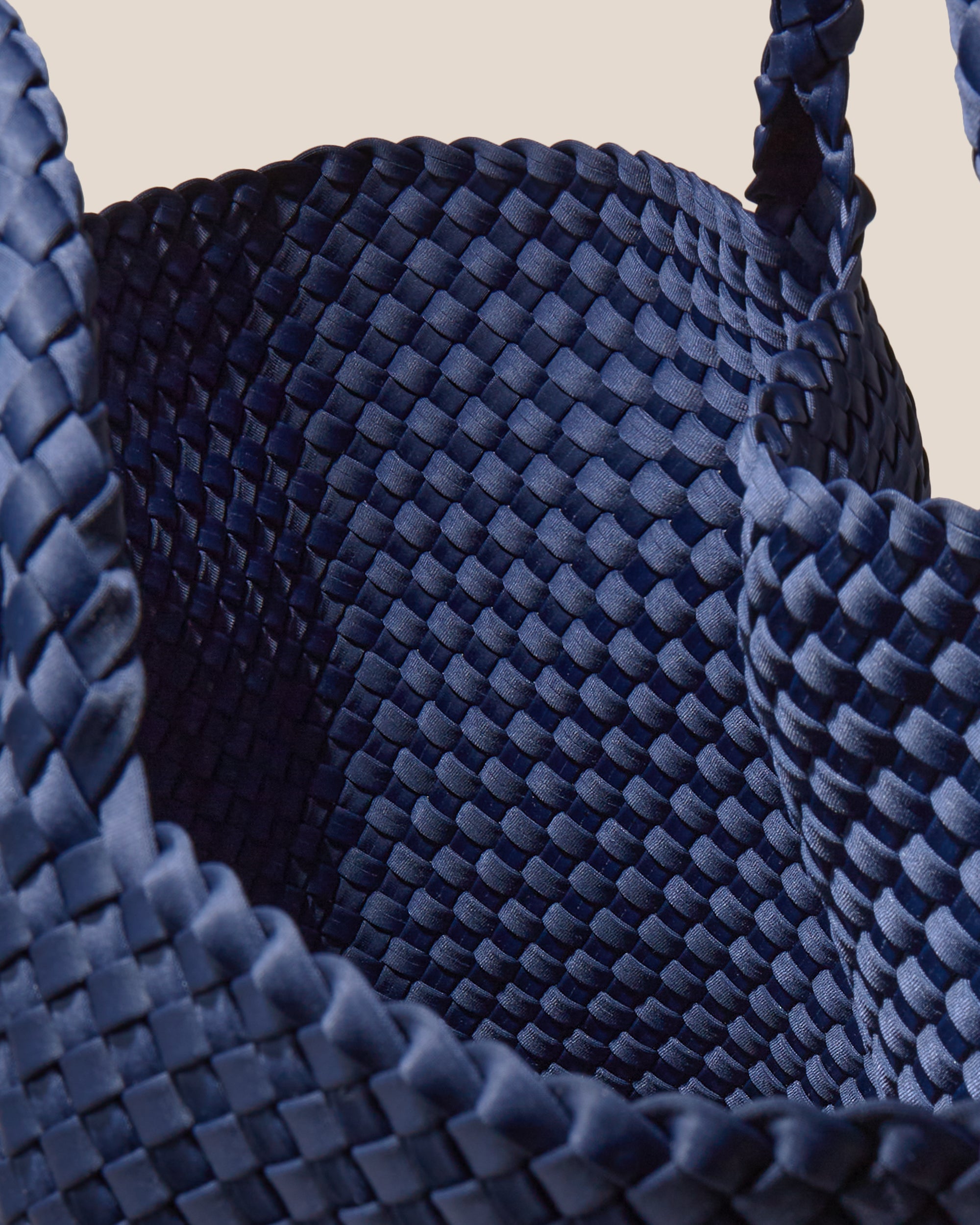 Interior close-up of St. Barths Tote in Ink Blue showing its open top, and unlined interior.