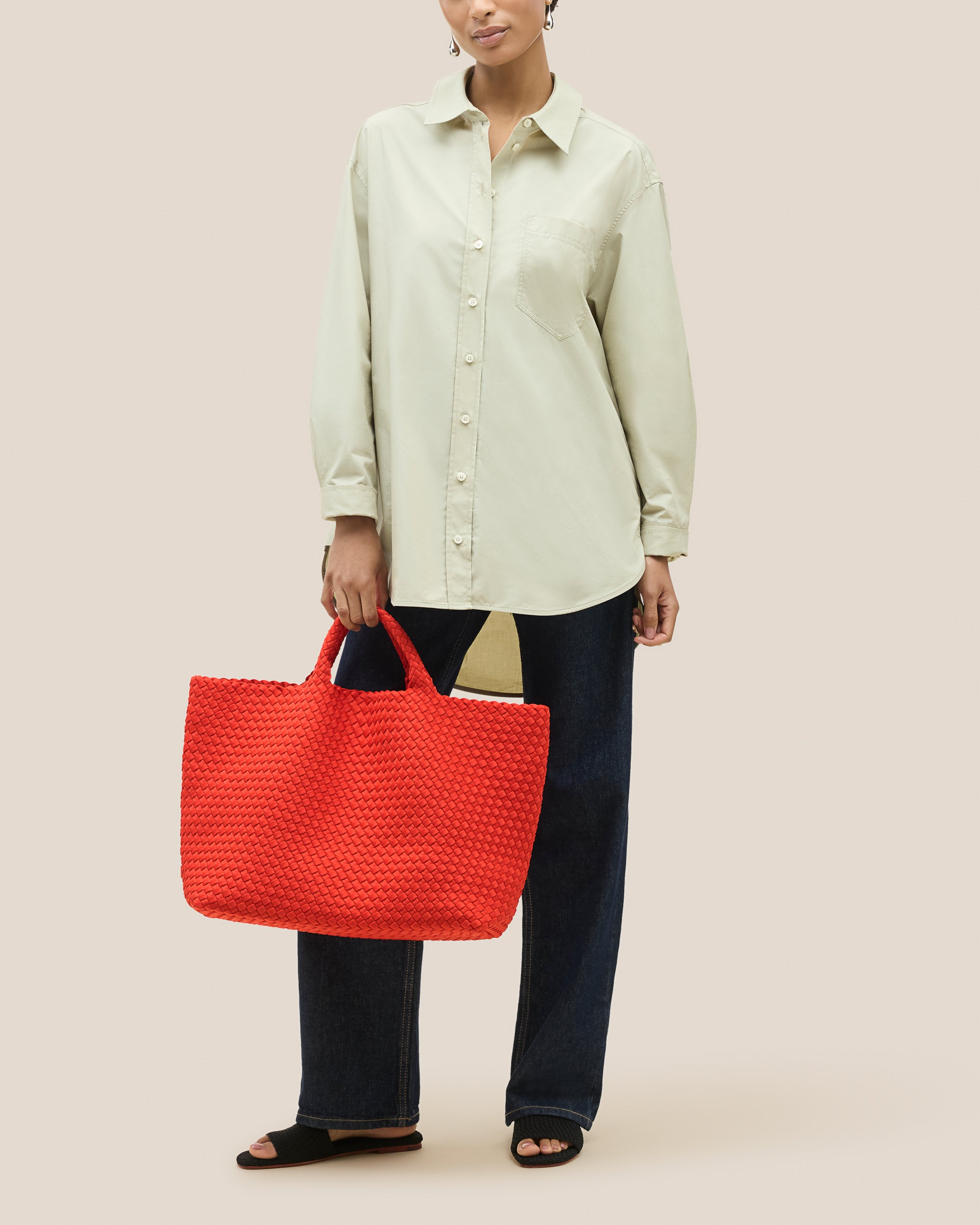 St. Barths Tote in Ipanema shown on model to illustrate scale and soft silhouette.