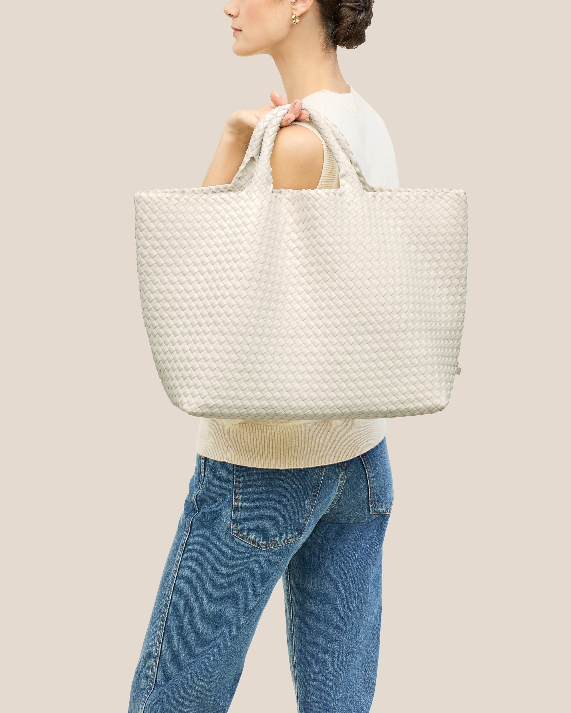 St. Barths Tote in Jasmine shown on model to illustrate scale and soft silhouette.