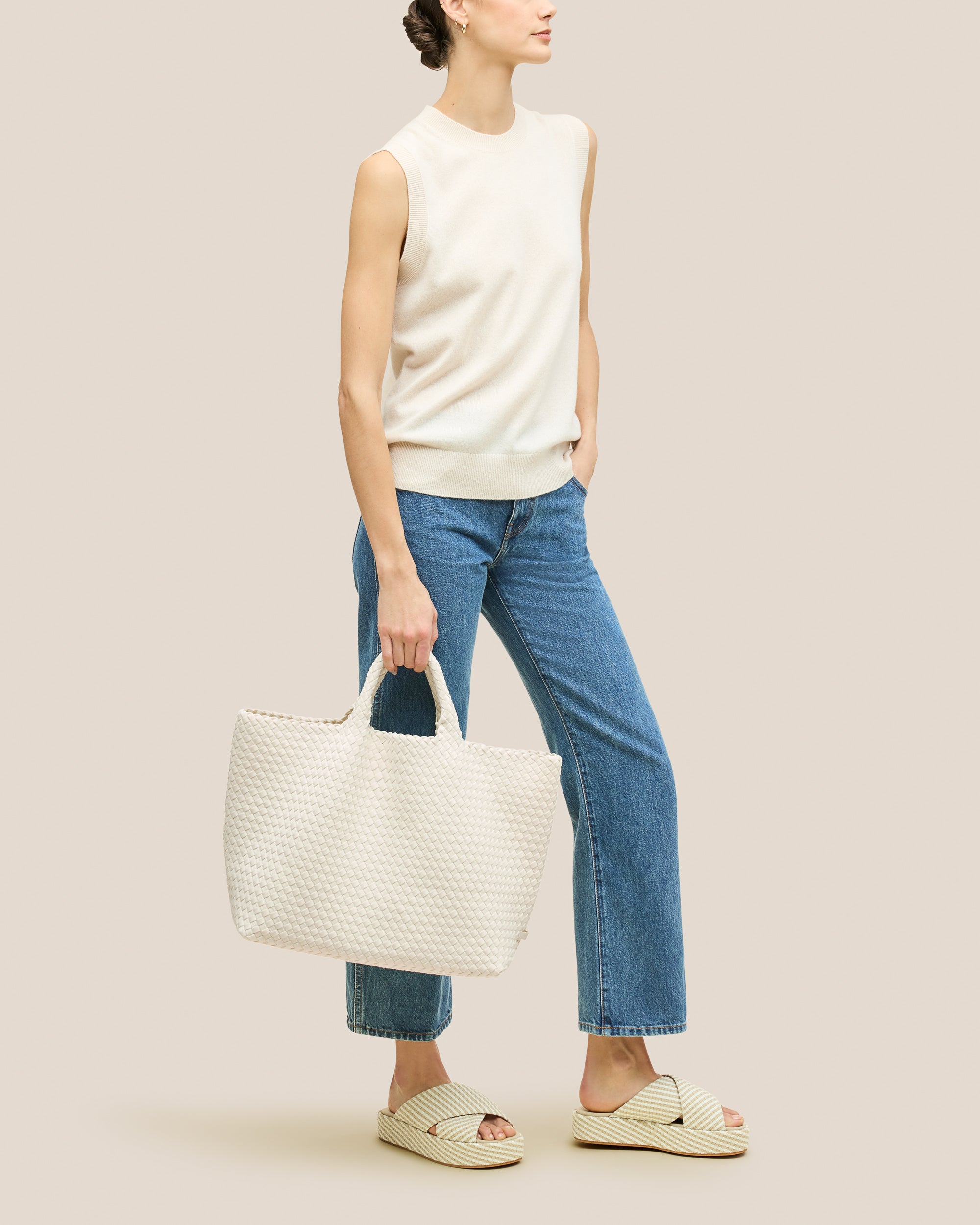 St. Barths Tote in Jasmine shown on model to illustrate scale and soft silhouette.