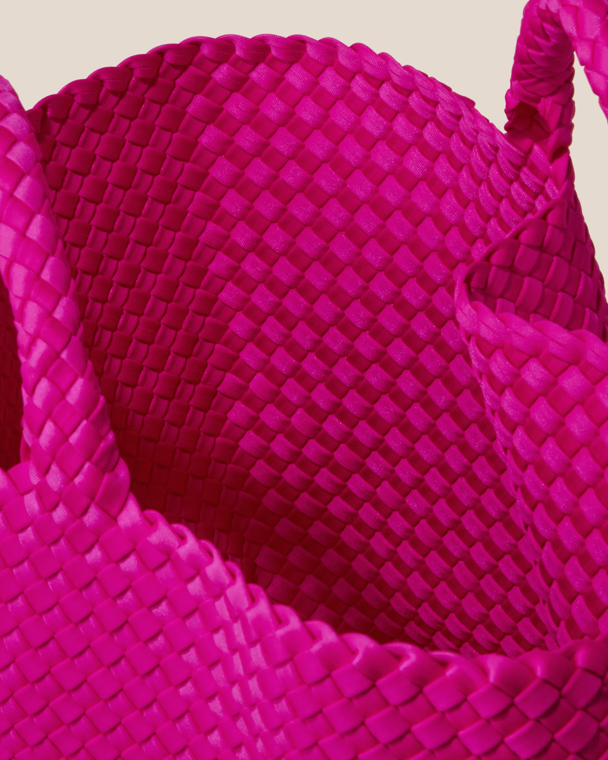 Interior close-up of St. Barths Tote in Miami Pink showing its open top, and unlined interior.