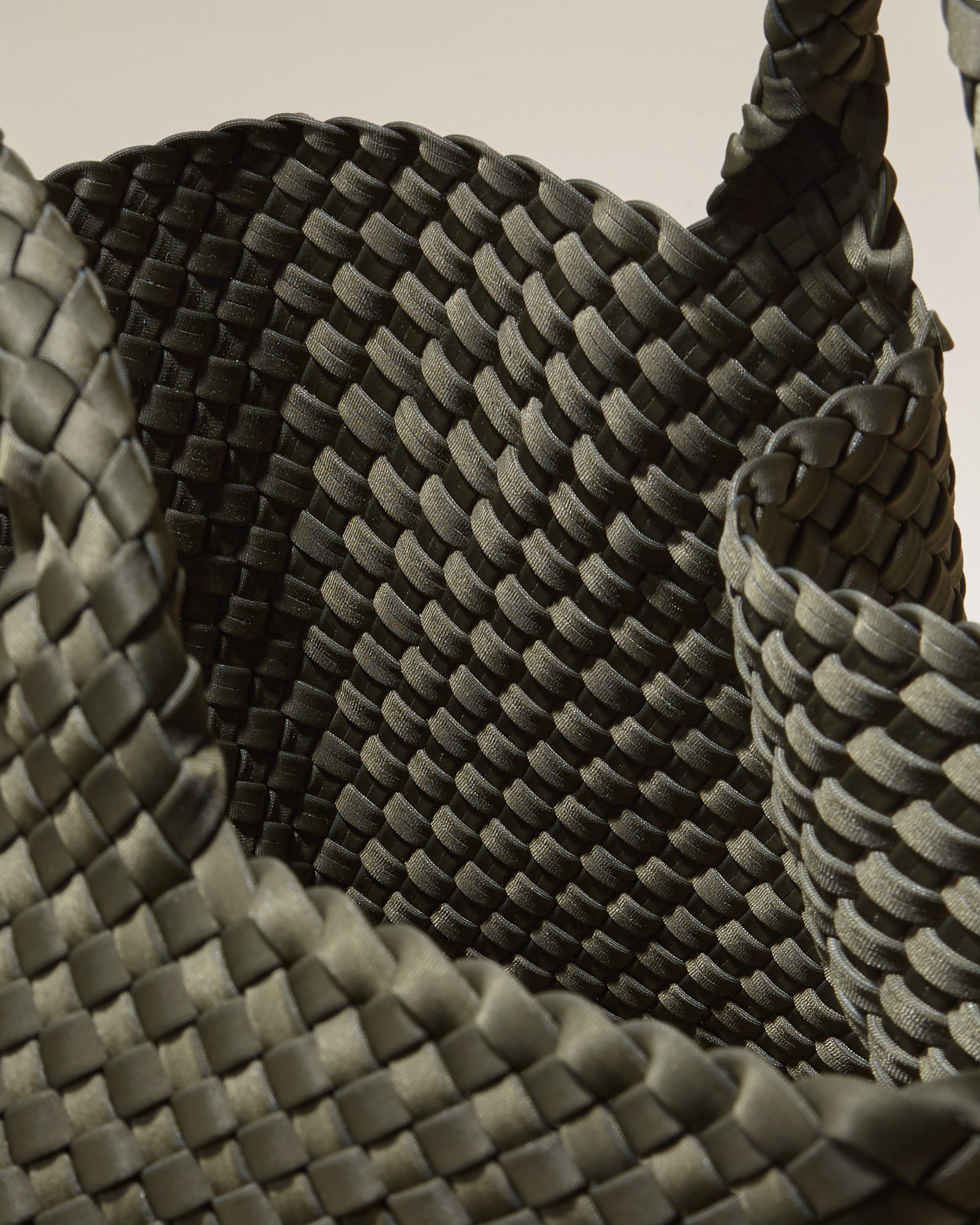 Interior close-up of St. Barths Tote in Olive showing its open top, and unlined interior.