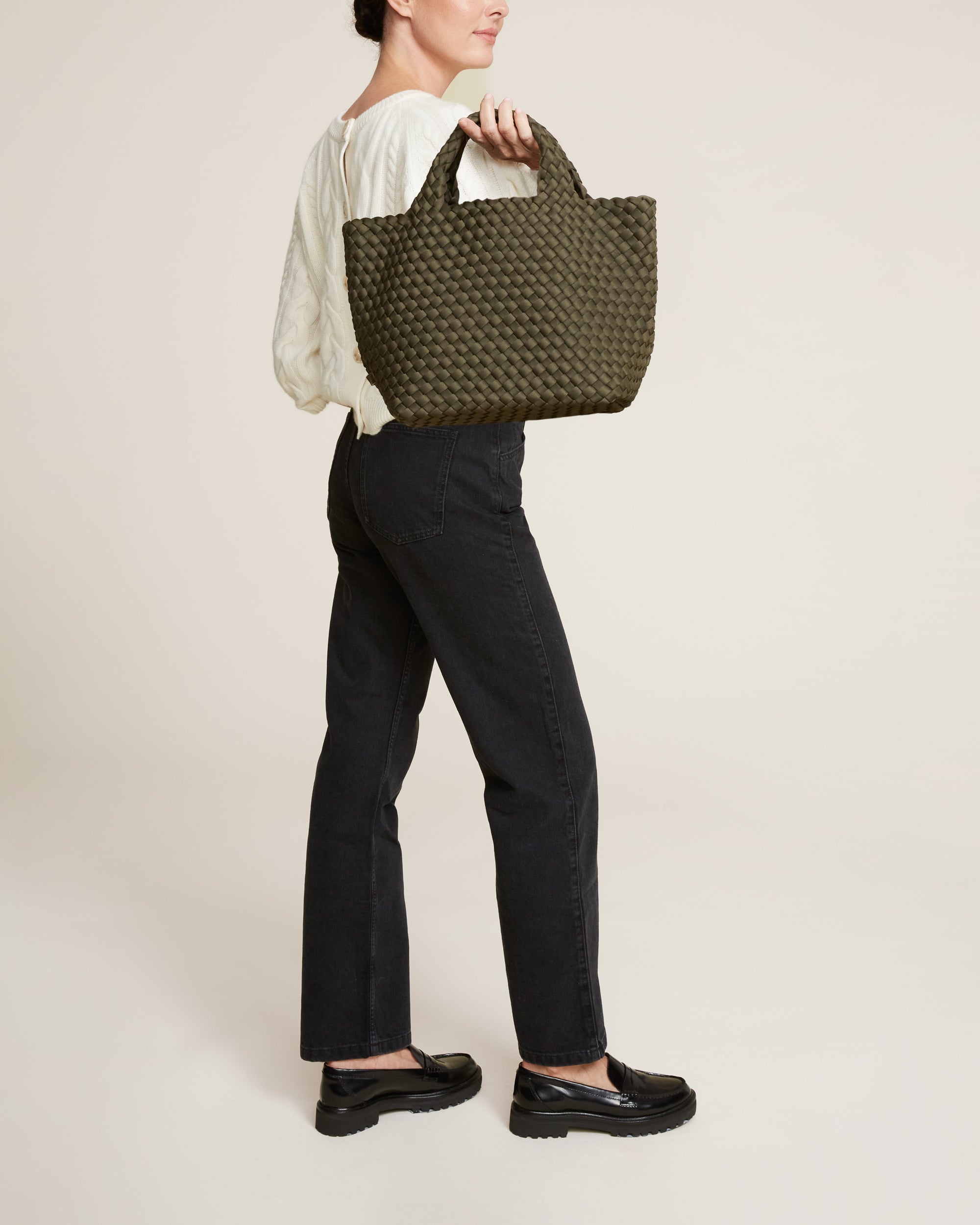 St. Barths Tote in Olive shown on model to illustrate scale and soft silhouette.
