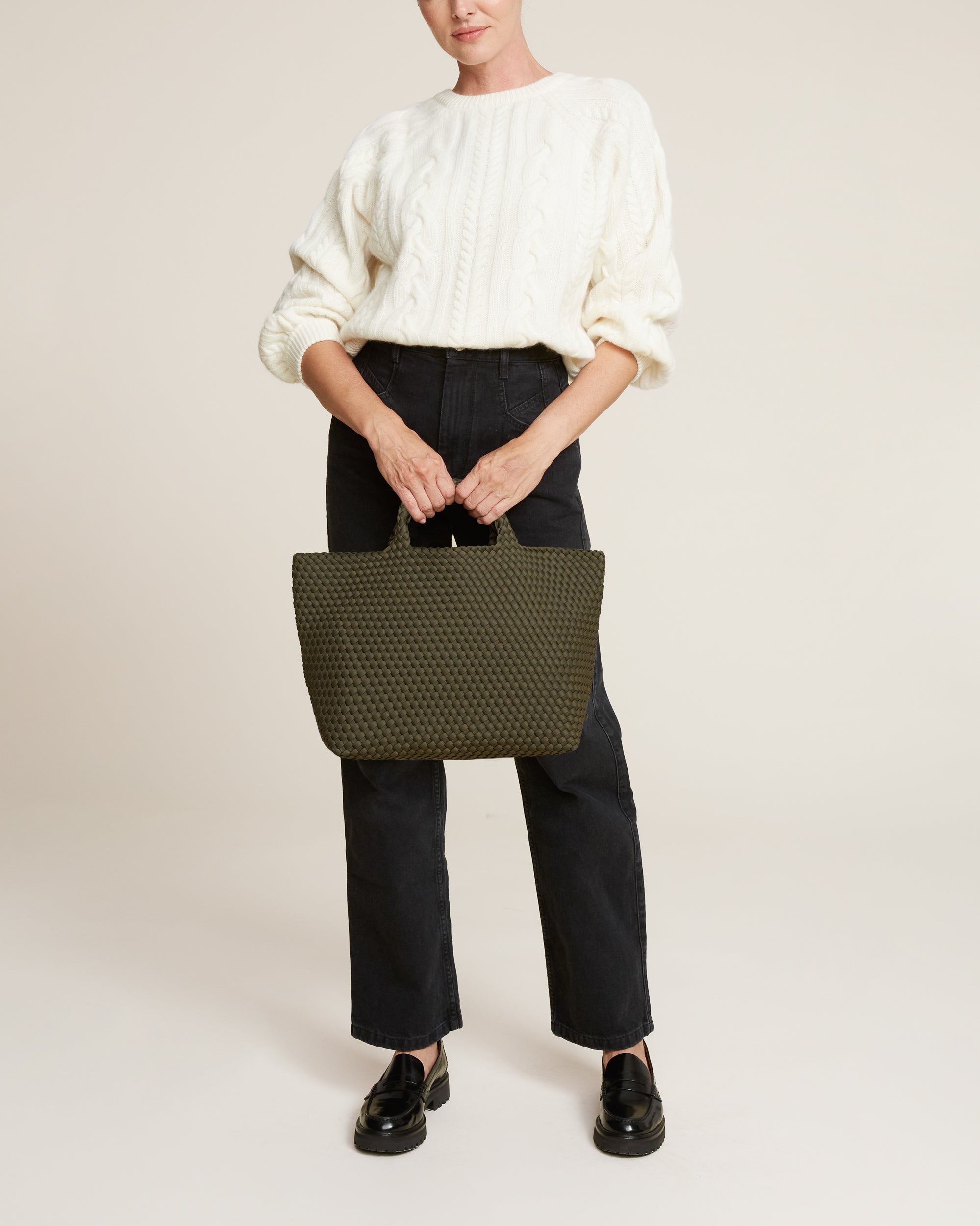 St. Barths Tote in Olive shown on model to illustrate scale and soft silhouette.