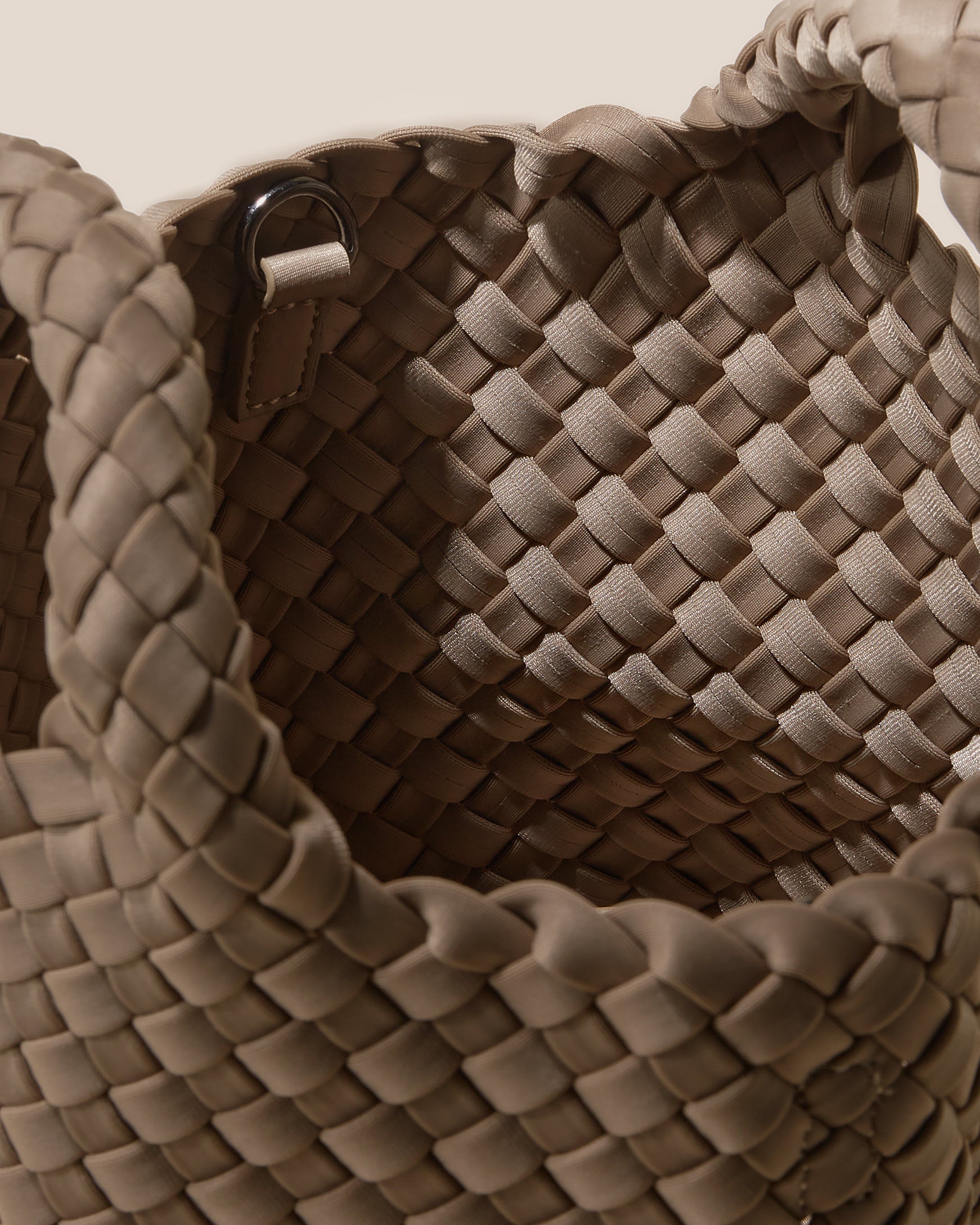 Interior close-up of St. Barths Tote in Cashmere showing its open top, and unlined interior.