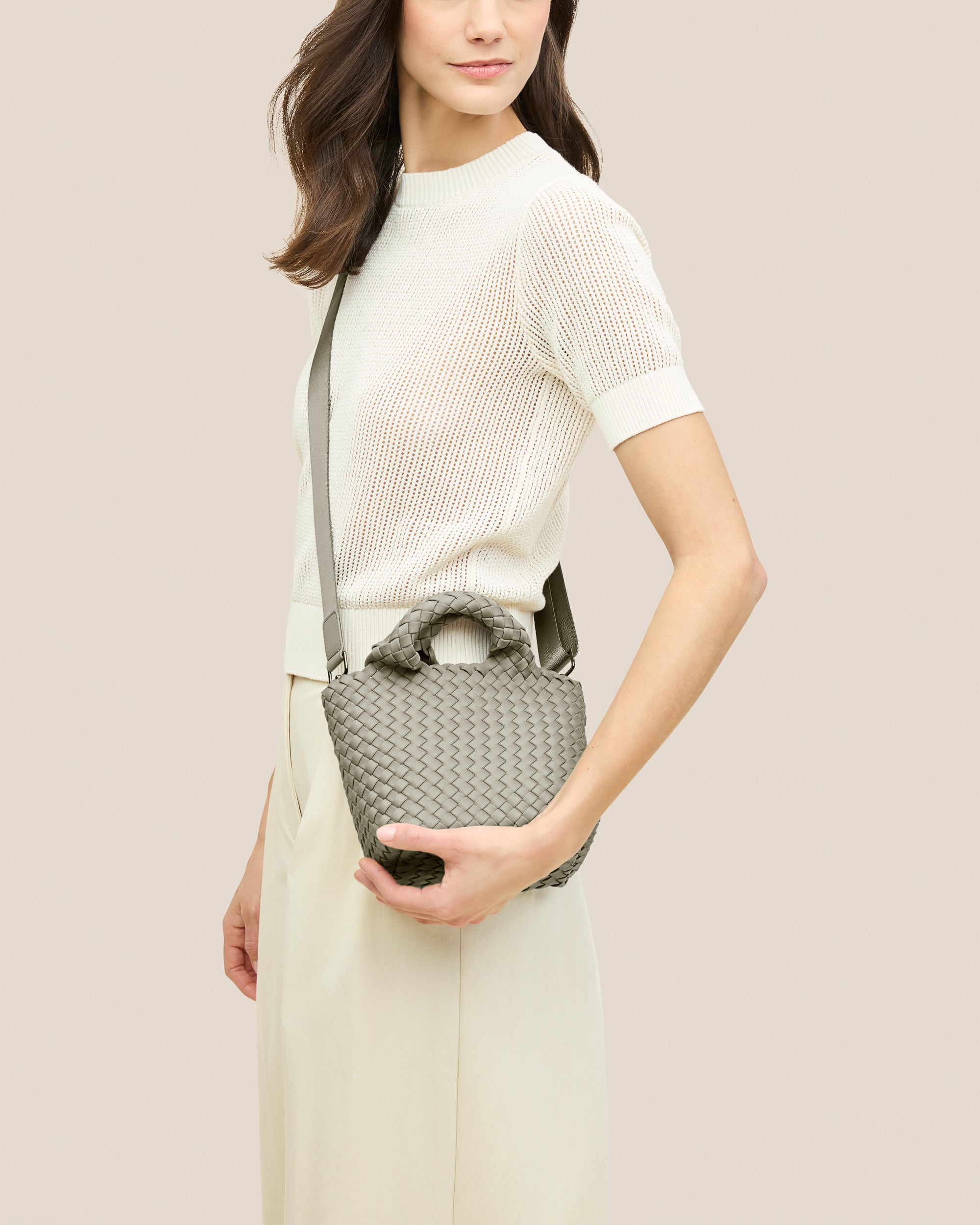 St. Barths Tote in Celadon shown on model to illustrate scale and soft silhouette.