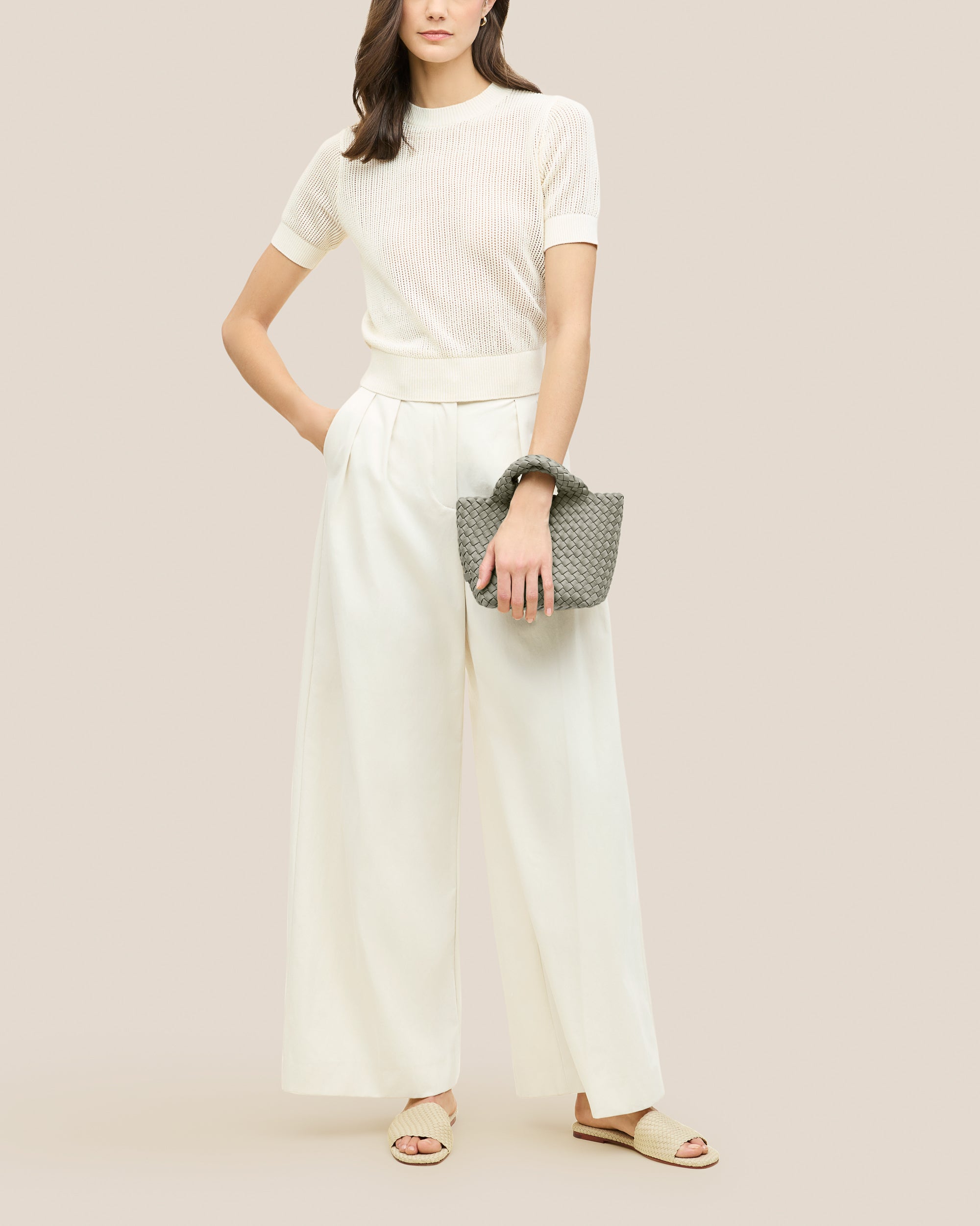 St. Barths Tote in Celadon shown on model to illustrate scale and soft silhouette.