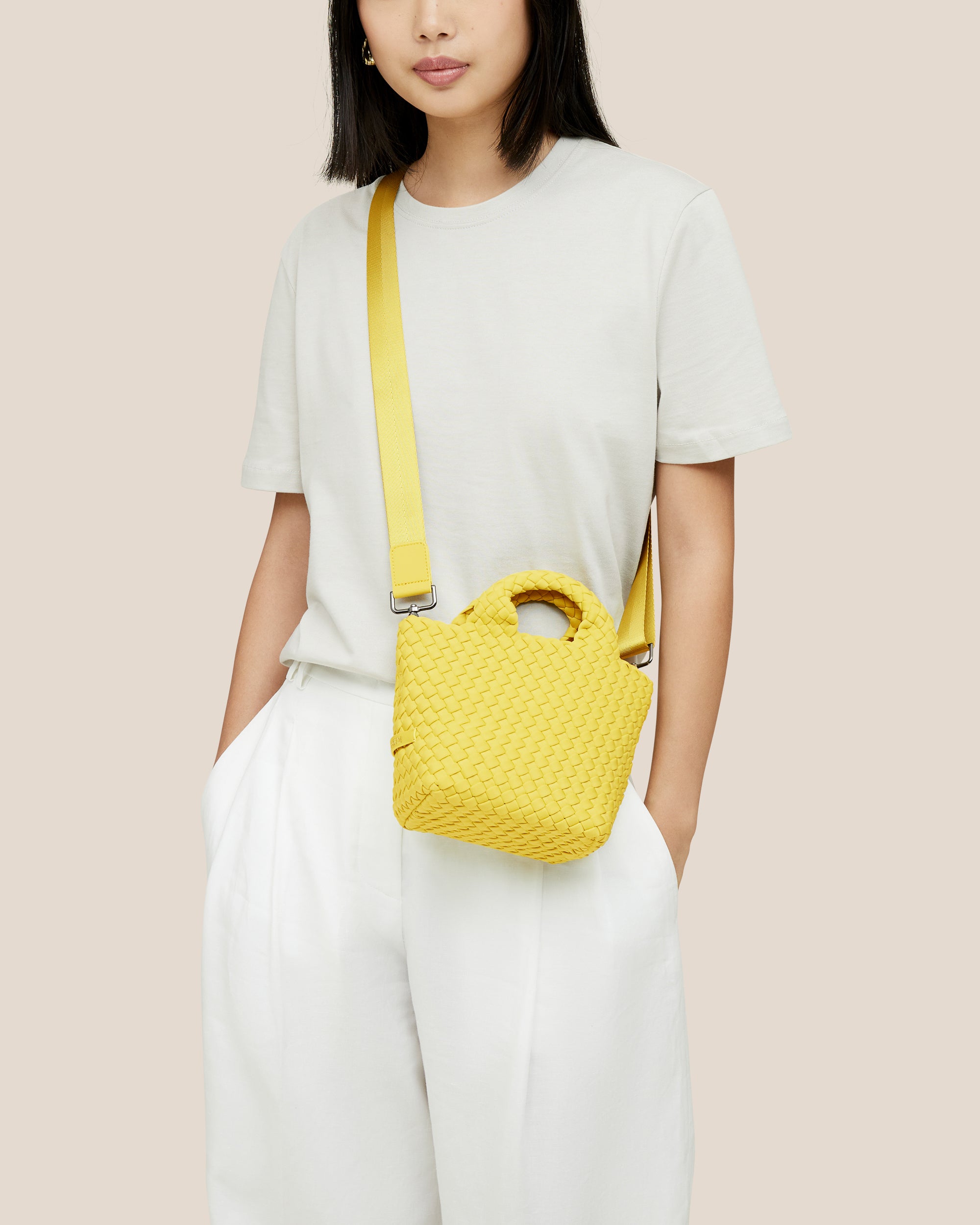 St. Barths Tote in Citron shown on model to illustrate scale and soft silhouette.