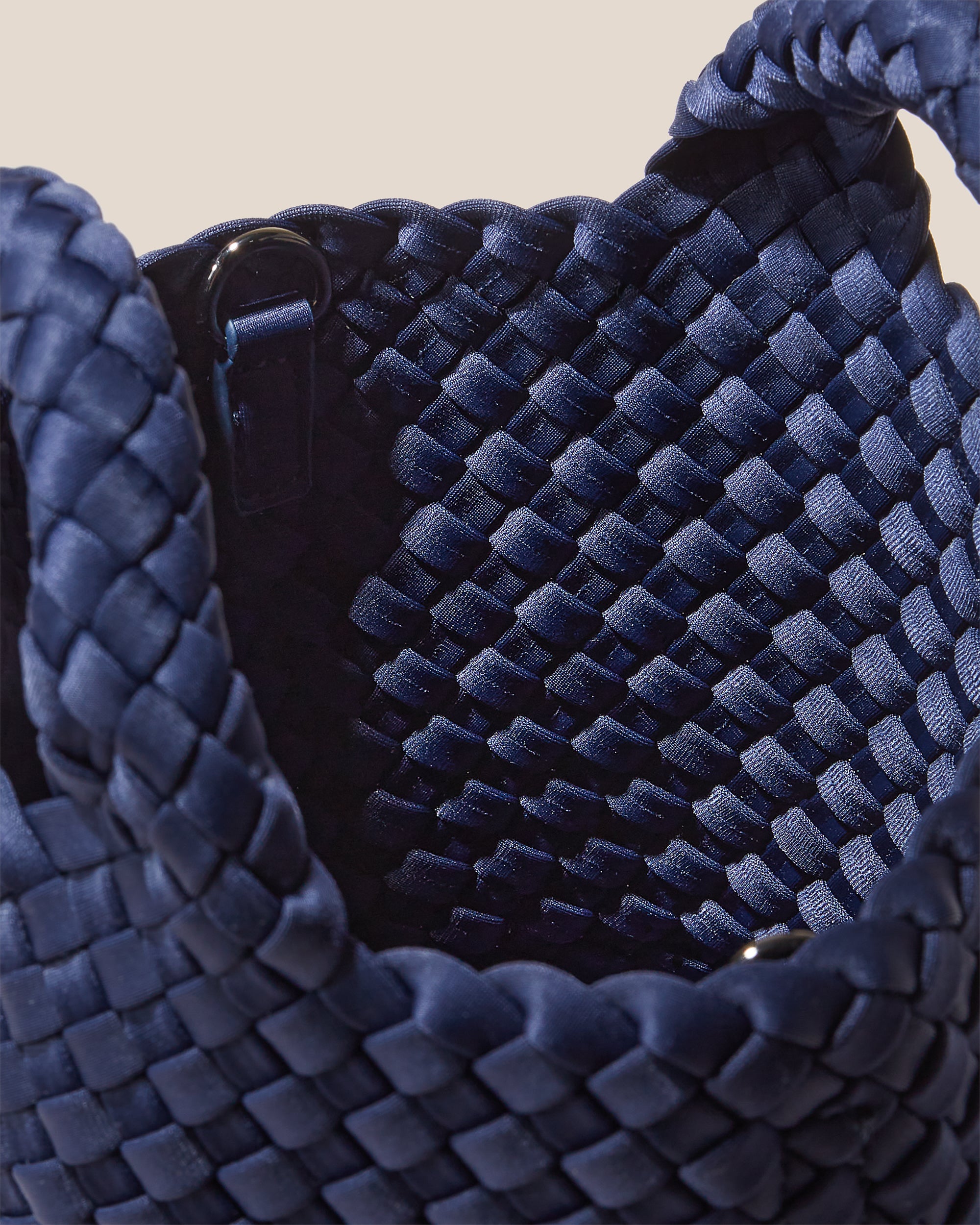 Interior close-up of St. Barths Tote in Ink Blue showing its open top, and unlined interior.