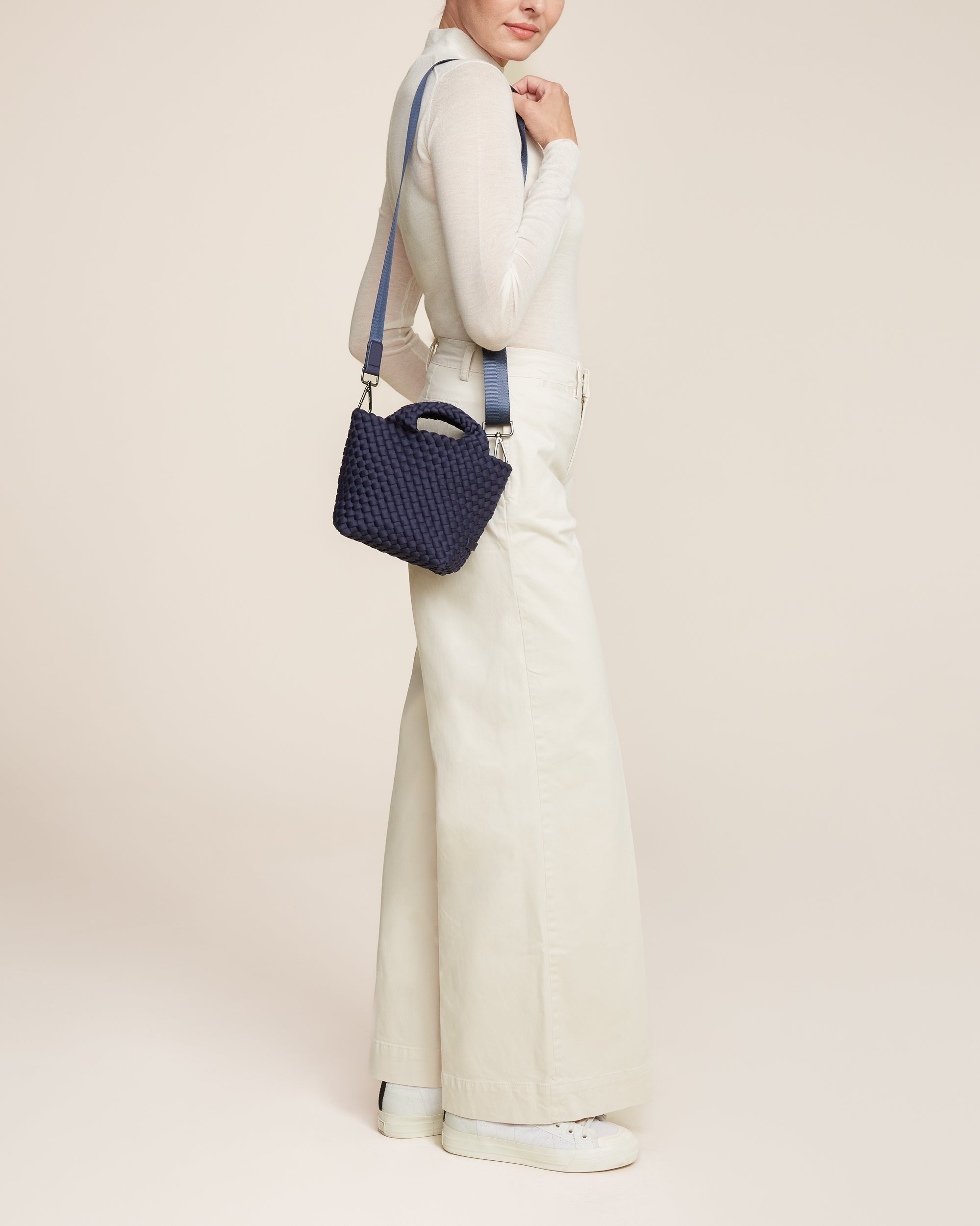 St. Barths Tote in Ink Blue shown on model to illustrate scale and soft silhouette.