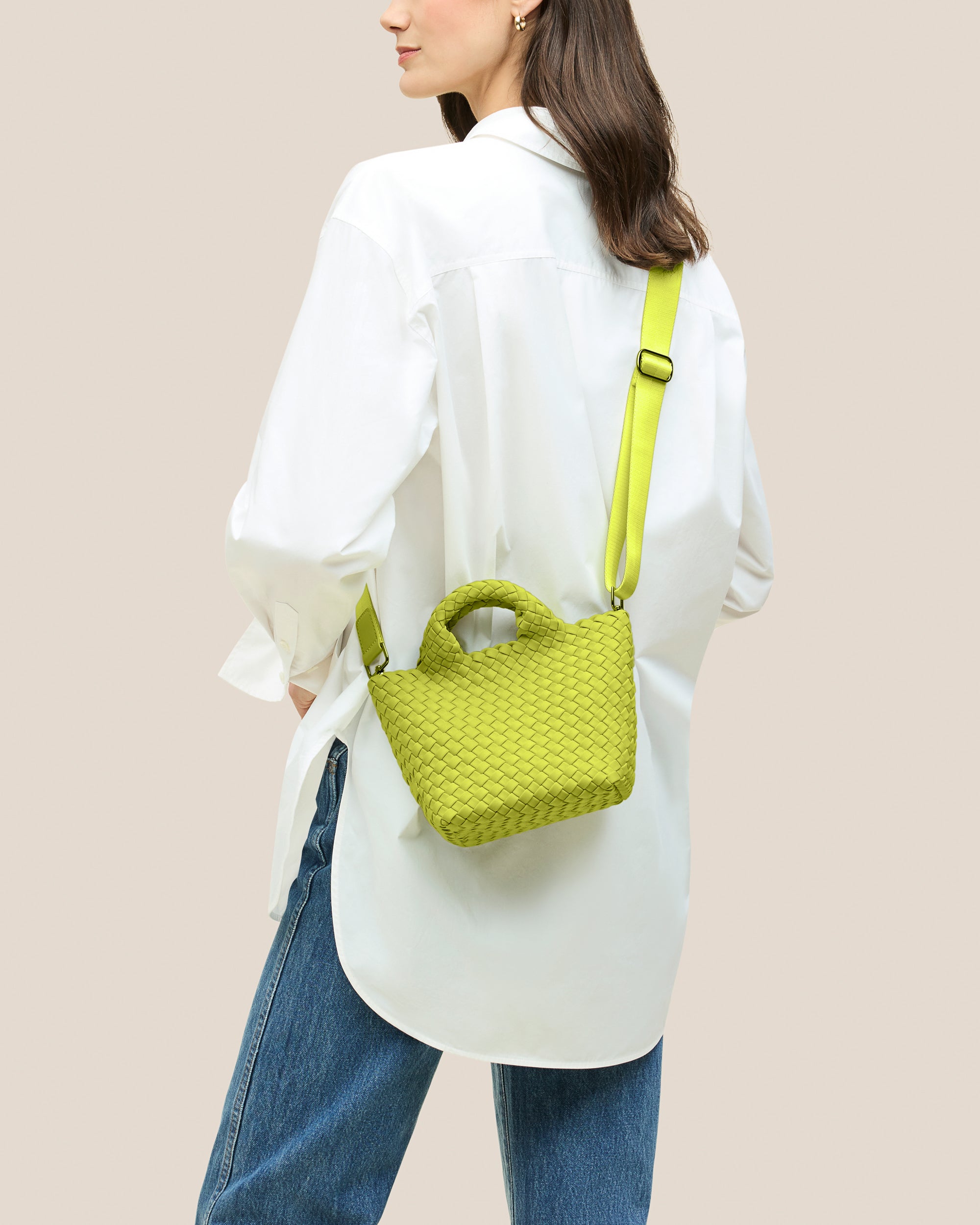 St. Barths Tote in Matcha shown on model to illustrate scale and soft silhouette.