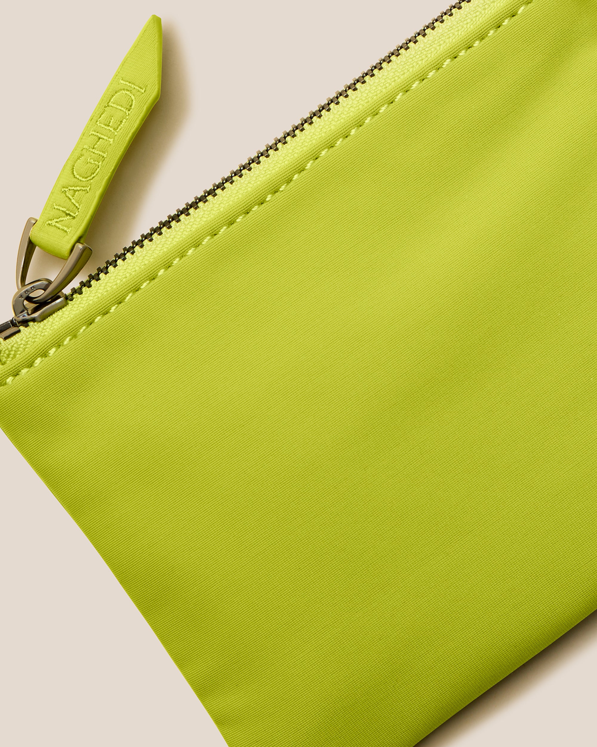 Close-up of included coordinating neoprene zippered pouch.
