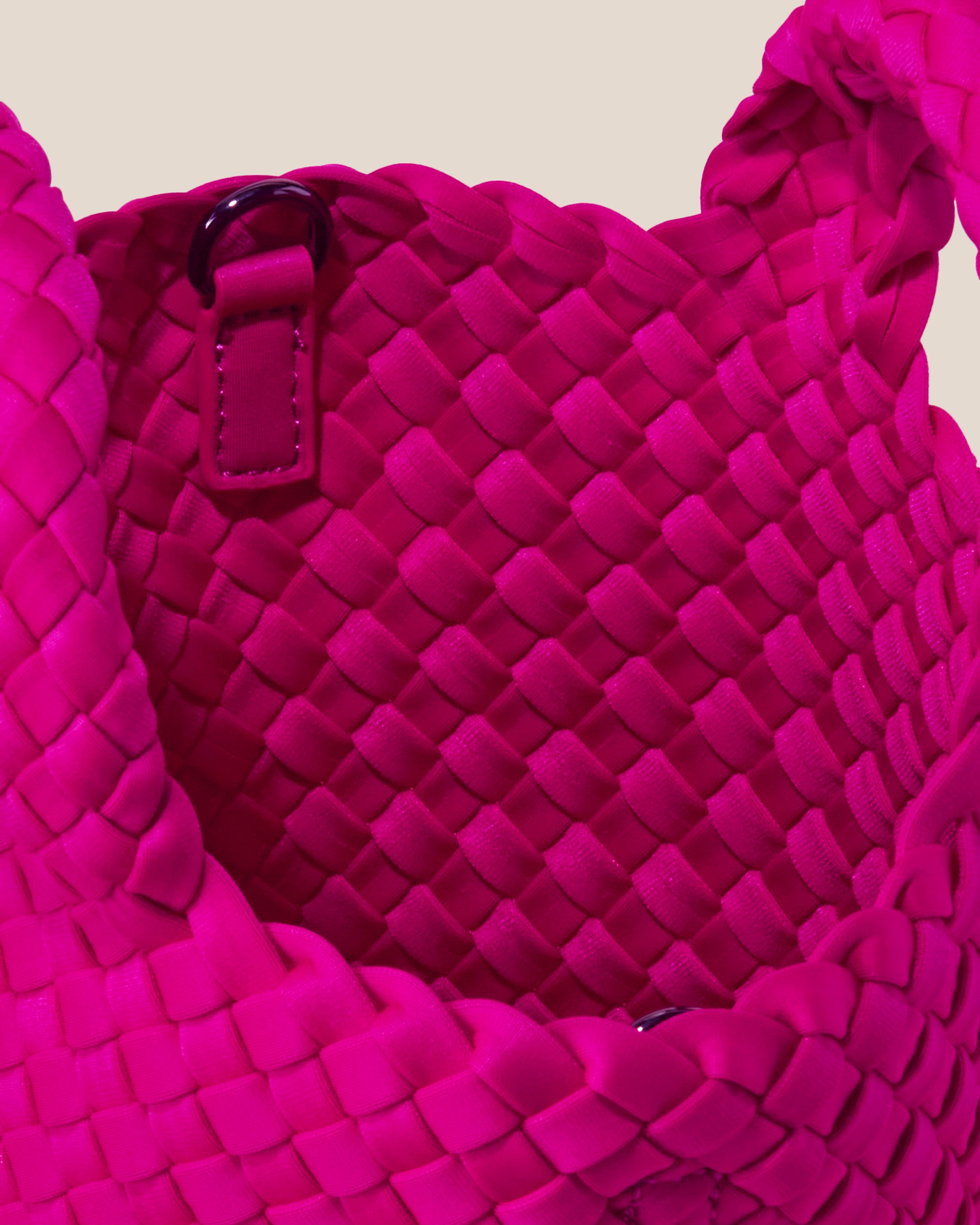 Interior close-up of St. Barths Tote in Miami Pink showing its open top, and unlined interior.