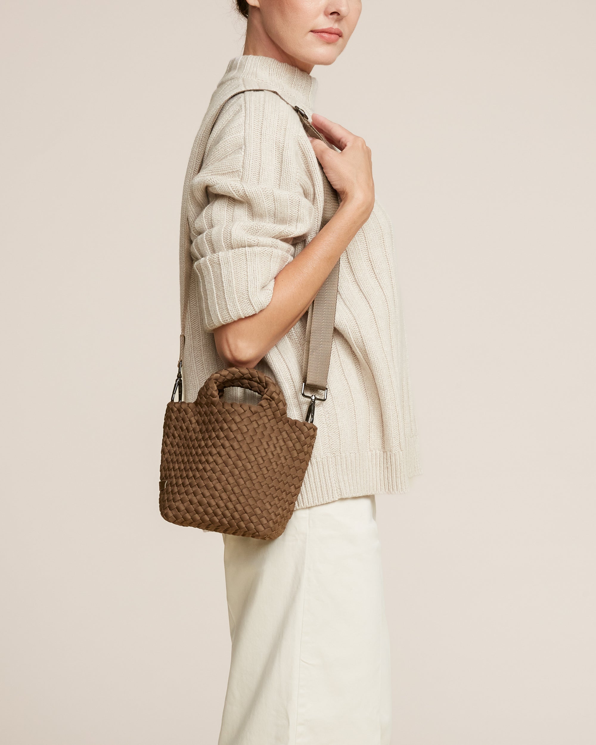 St. Barths Tote in Mink shown on model to illustrate scale and soft silhouette.