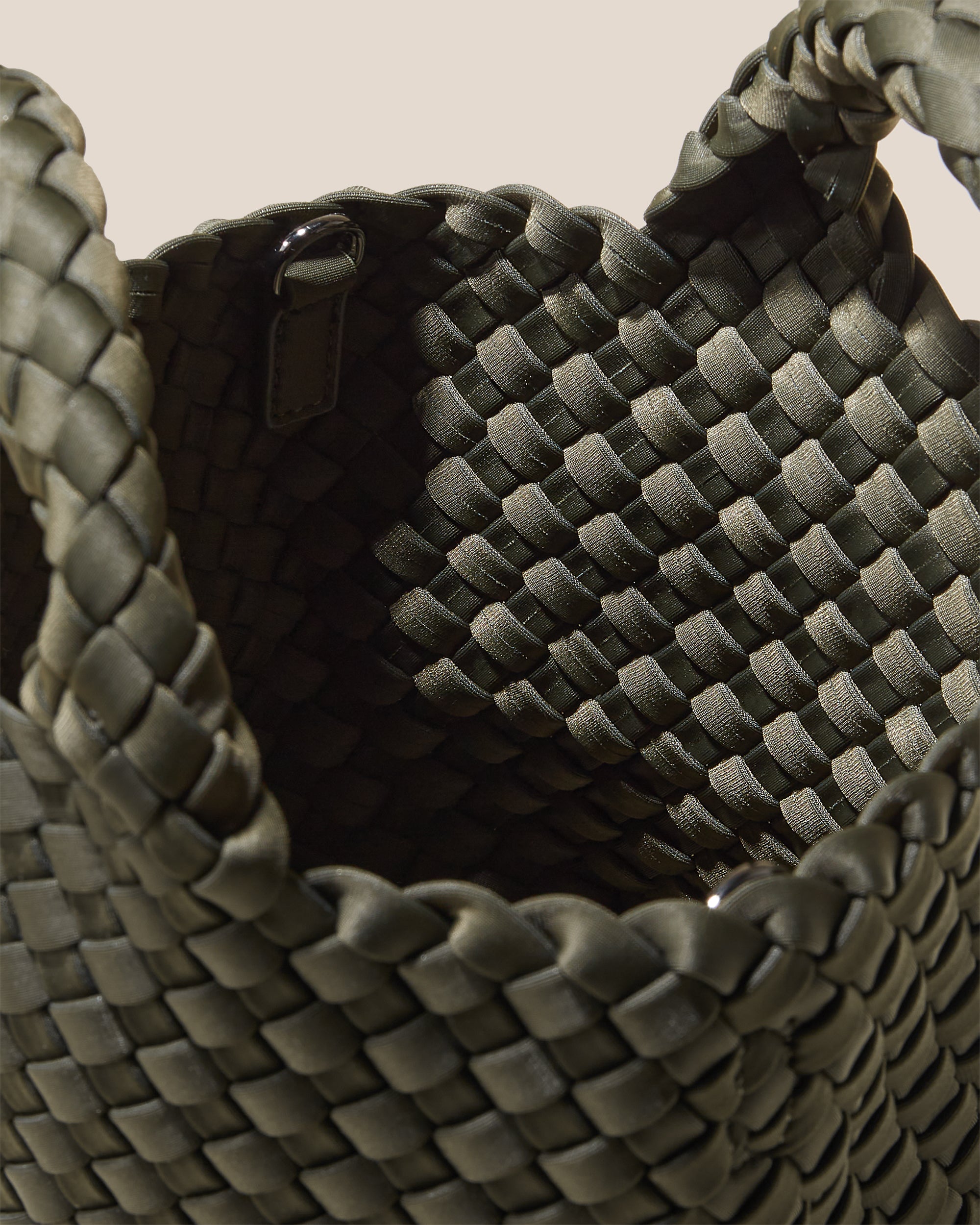 Interior close-up of St. Barths Tote in Olive showing its open top, and unlined interior.