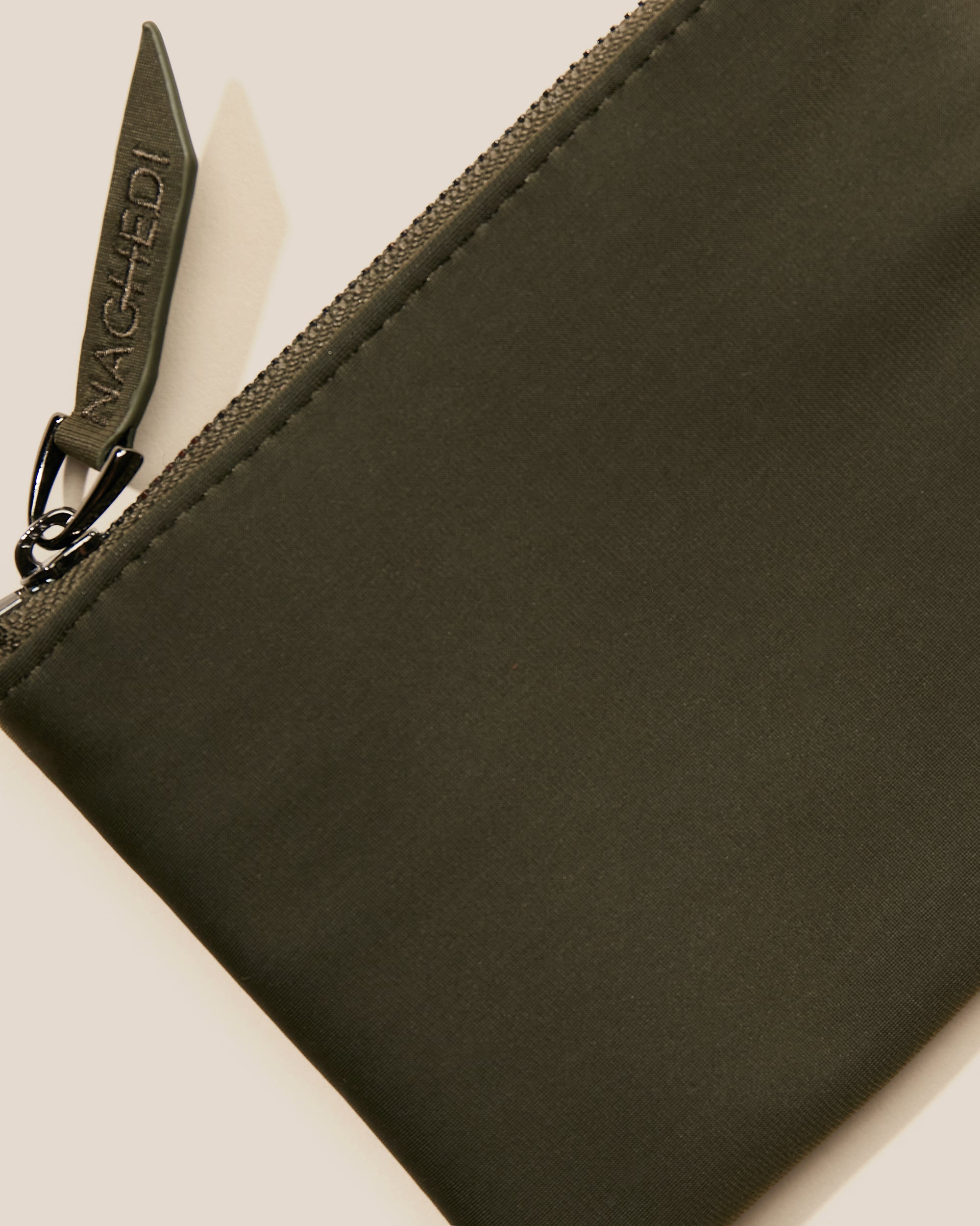 Close-up of included coordinating neoprene zippered pouch.