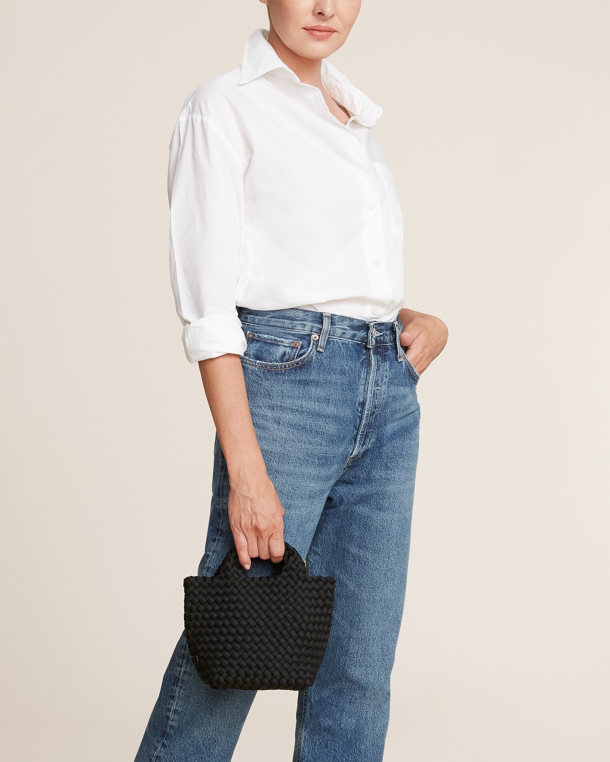 St. Barths Tote in Onyx shown on model to illustrate scale and soft silhouette.