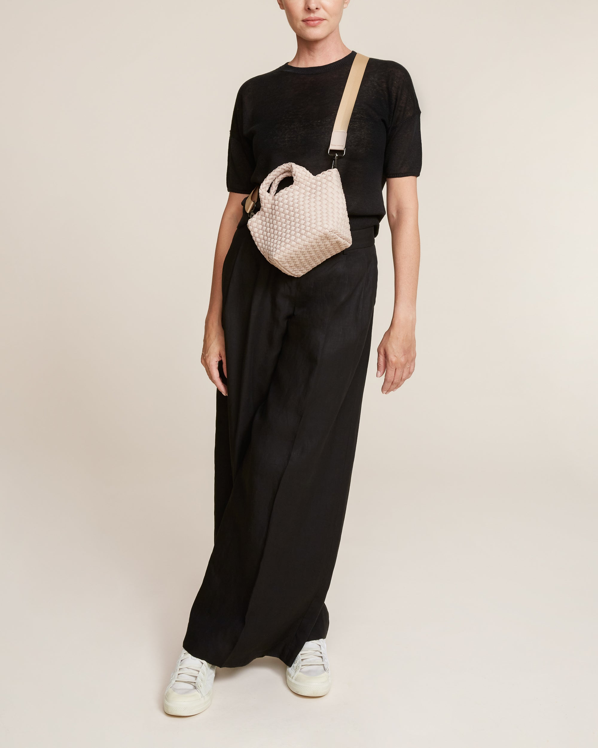 St. Barths Tote in Shell Pink shown on model to illustrate scale and soft silhouette.