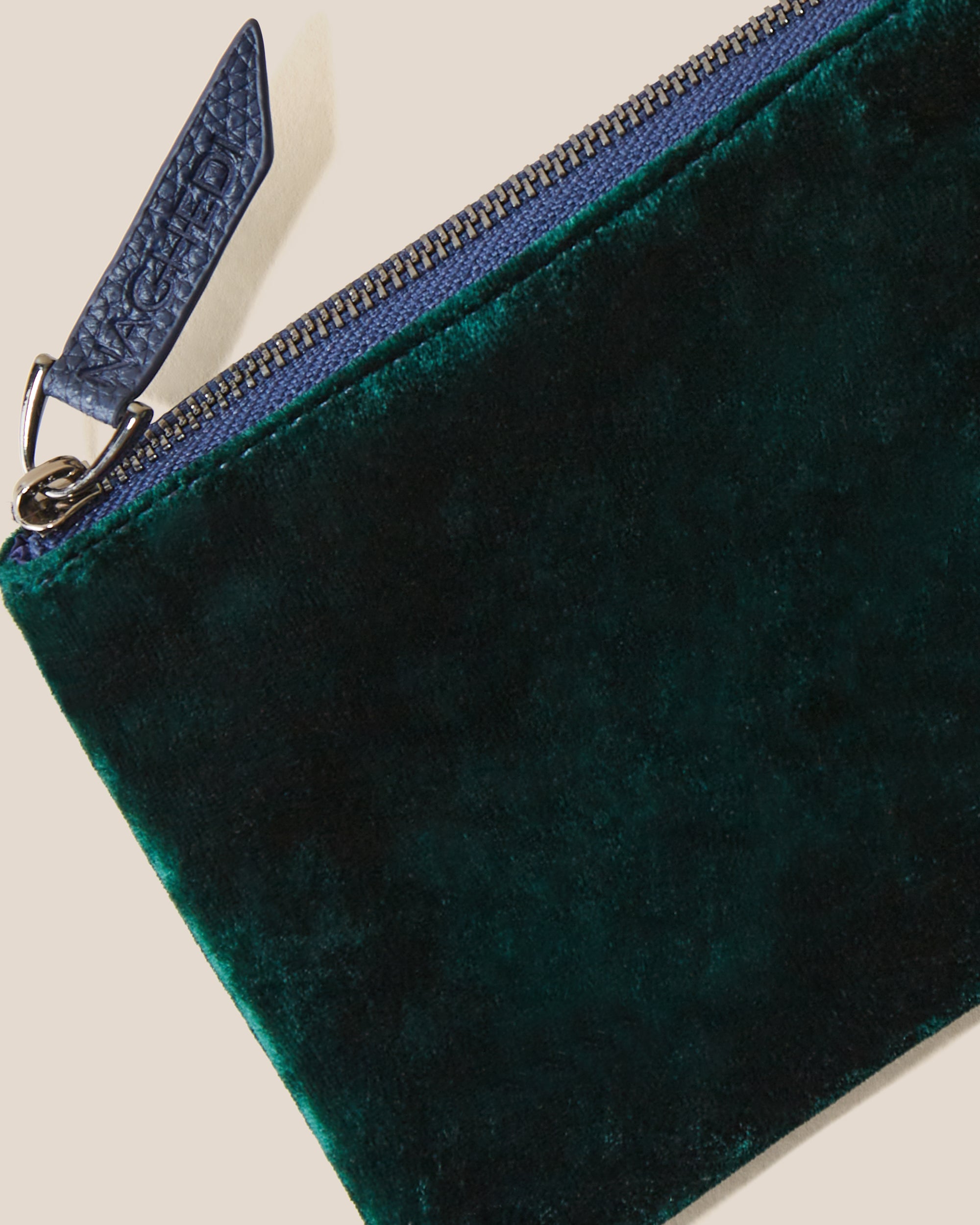 Close-up of included coordinating neoprene zippered pouch.
