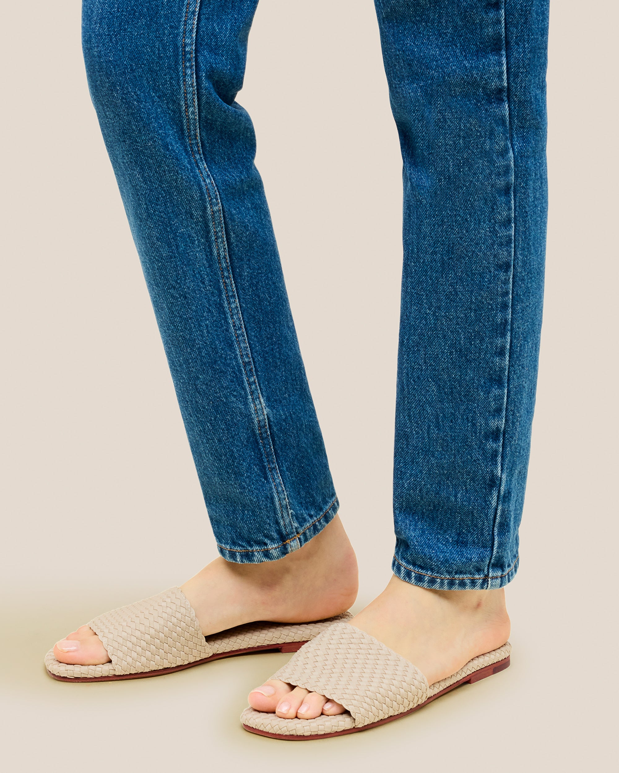 The St. Barths Slide in Ecru shown on model.