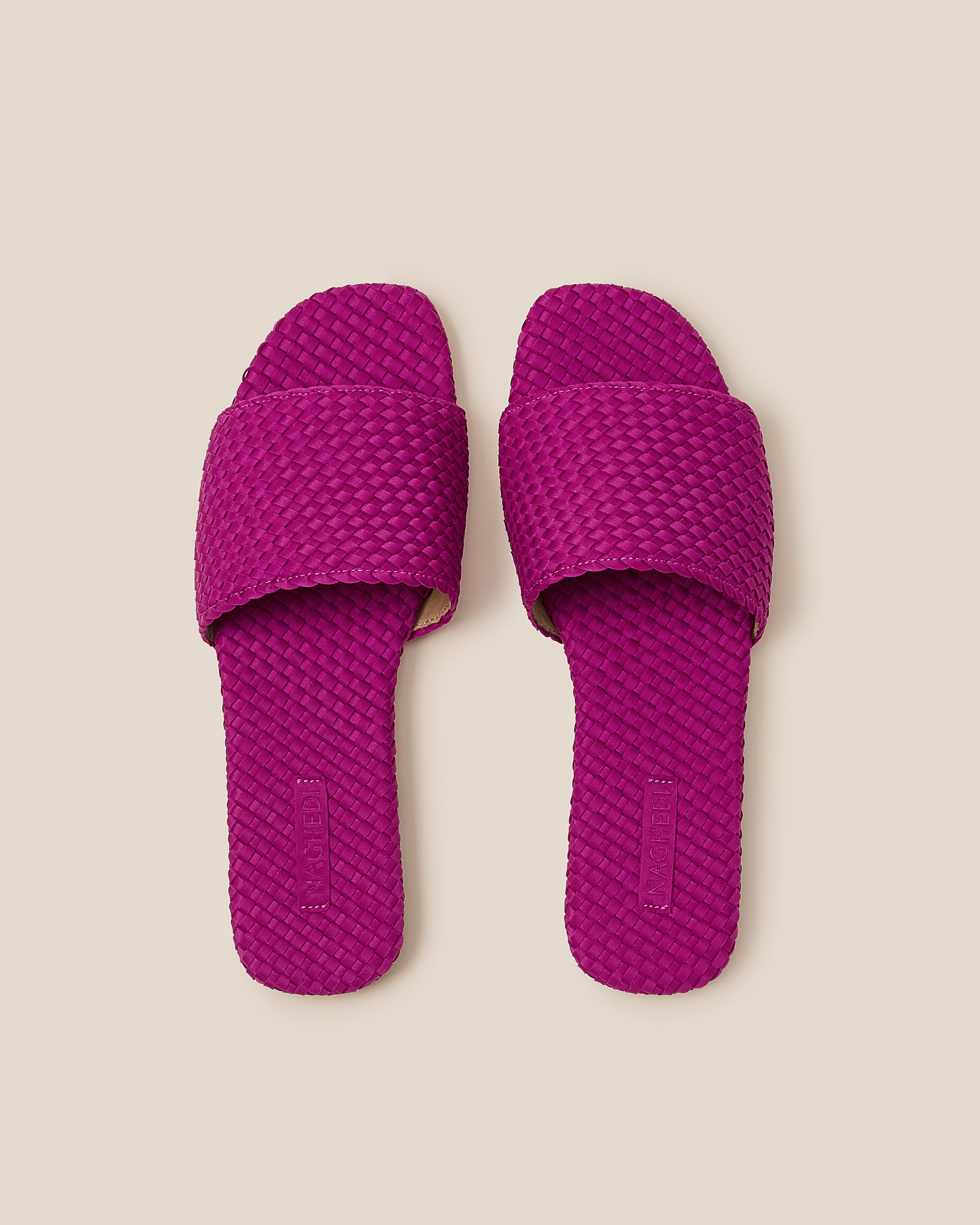 Top view of pair of The St. Barths Slide in Rio showing the handwoven neoprene insole.
