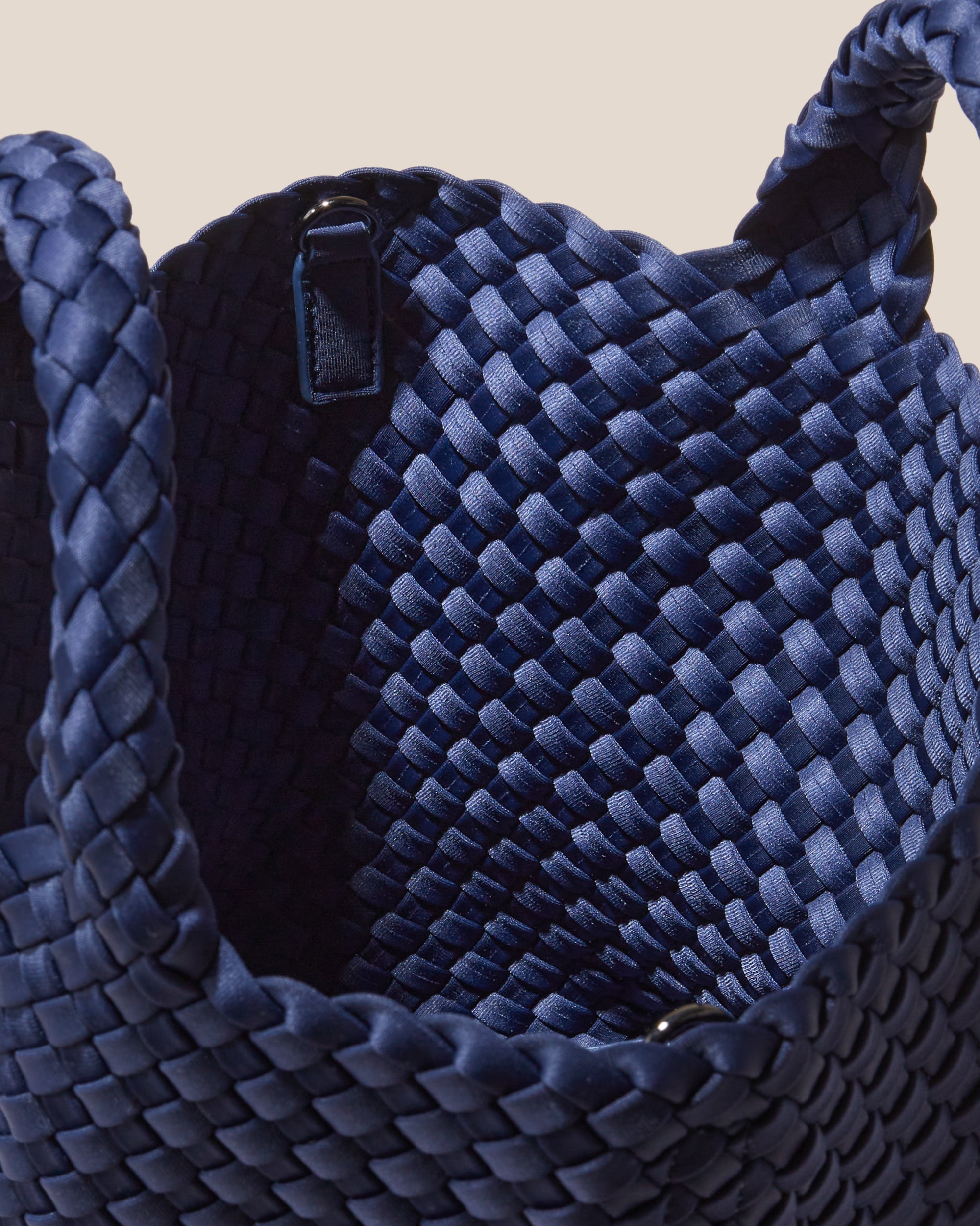 Interior close-up of St. Barths Tote in Ink Blue showing its open top, and unlined interior.