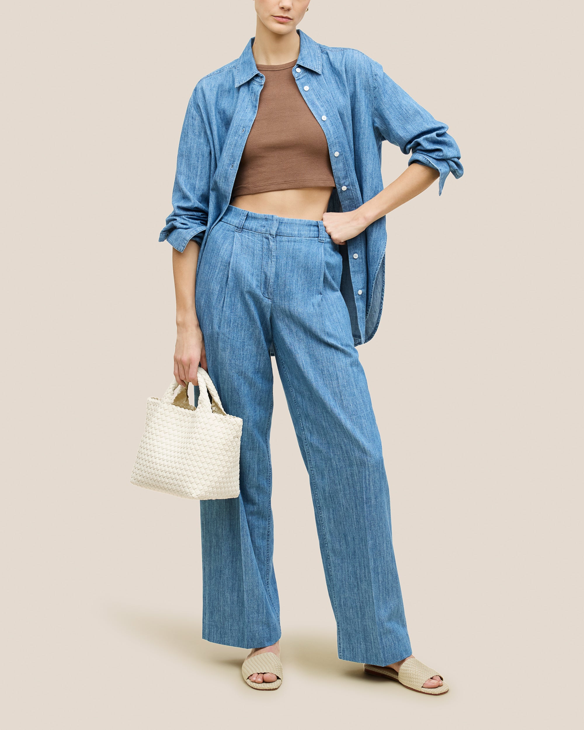 St. Barths Tote in Jasmine shown on model to illustrate scale and soft silhouette.