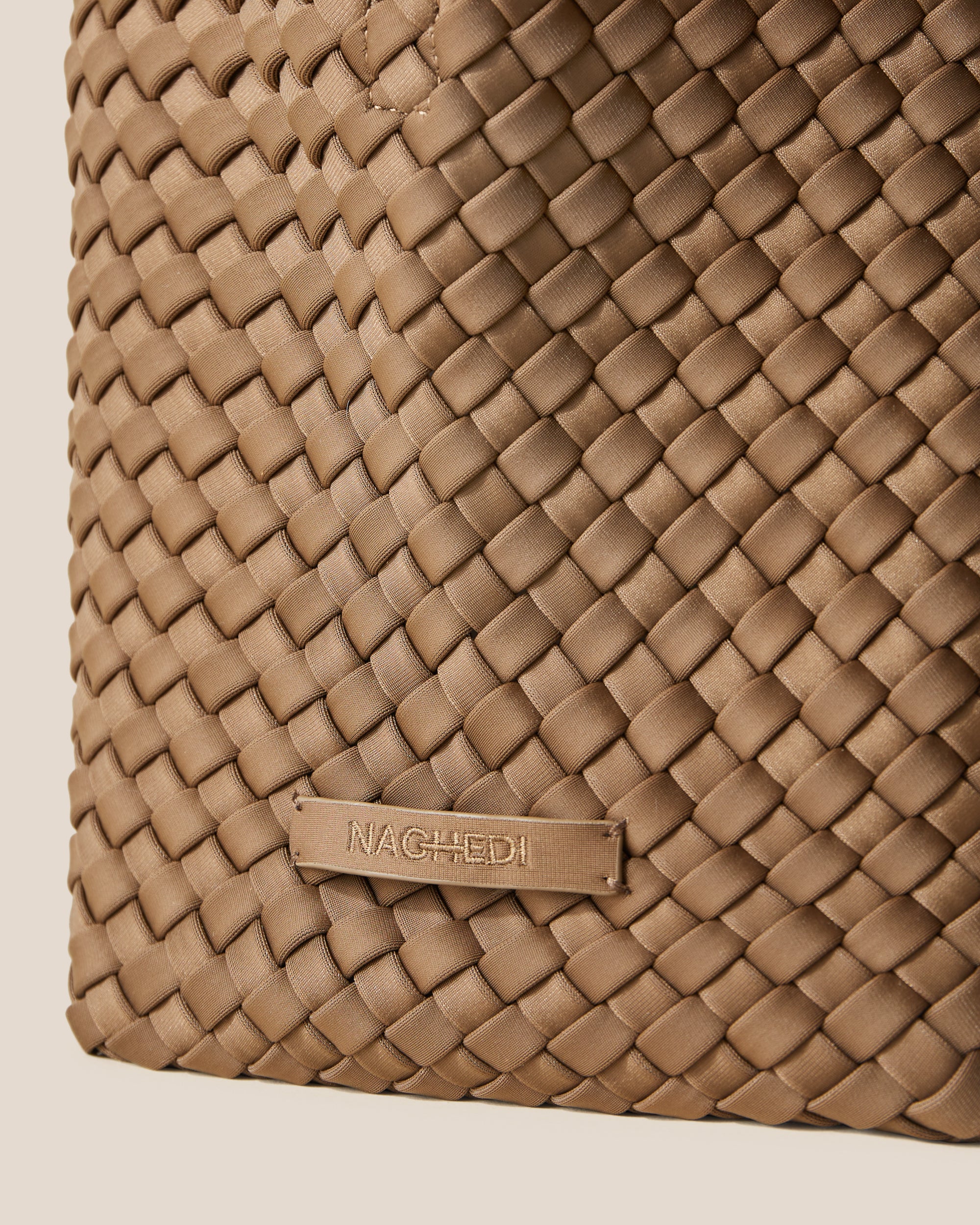 Close-up of stamped NAGHEDI logo on St. Barths Tote in Mink.