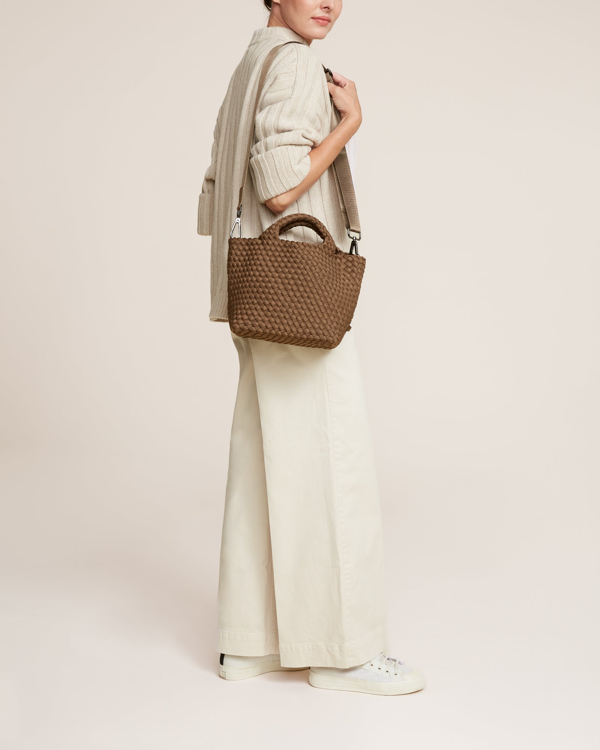 St. Barths Tote in Mink shown on model to illustrate scale and soft silhouette.