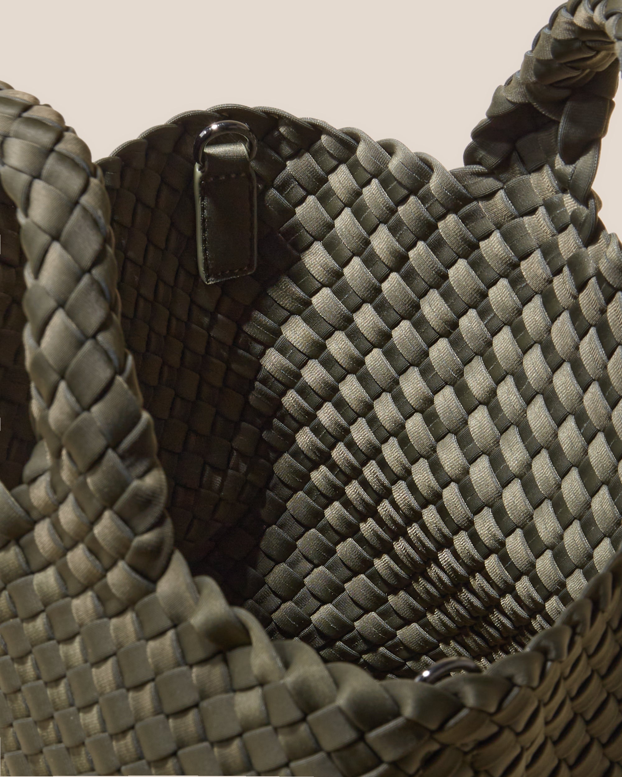 Interior close-up of St. Barths Tote in Olive showing its open top, and unlined interior.