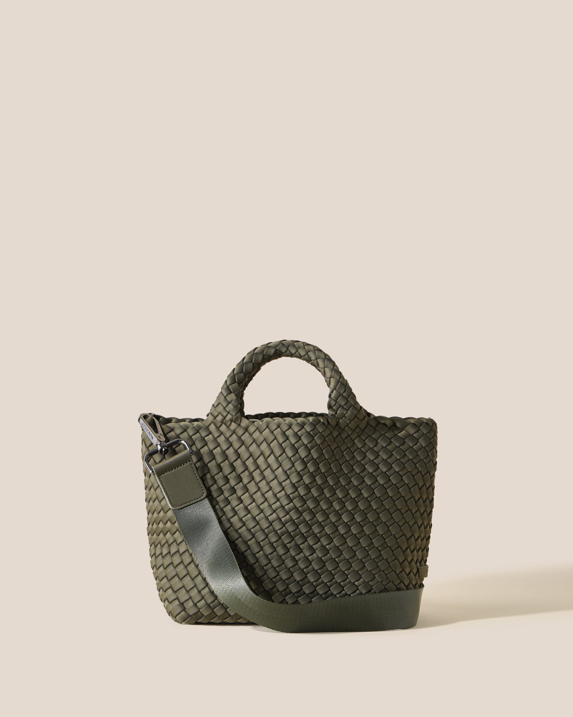 St. Barths Tote in Olive, an olive green tone, in handwoven neoprene, featuring an open top, woven top handles, and detachable, adjustable nylon crossbody strap.