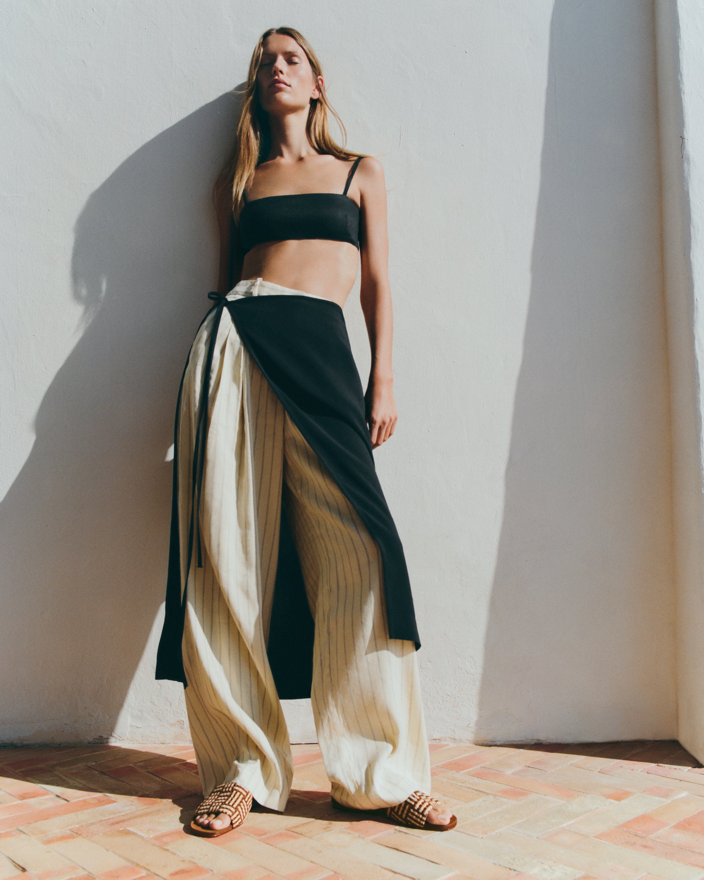 The Cairo Slide in Almond shown on model.