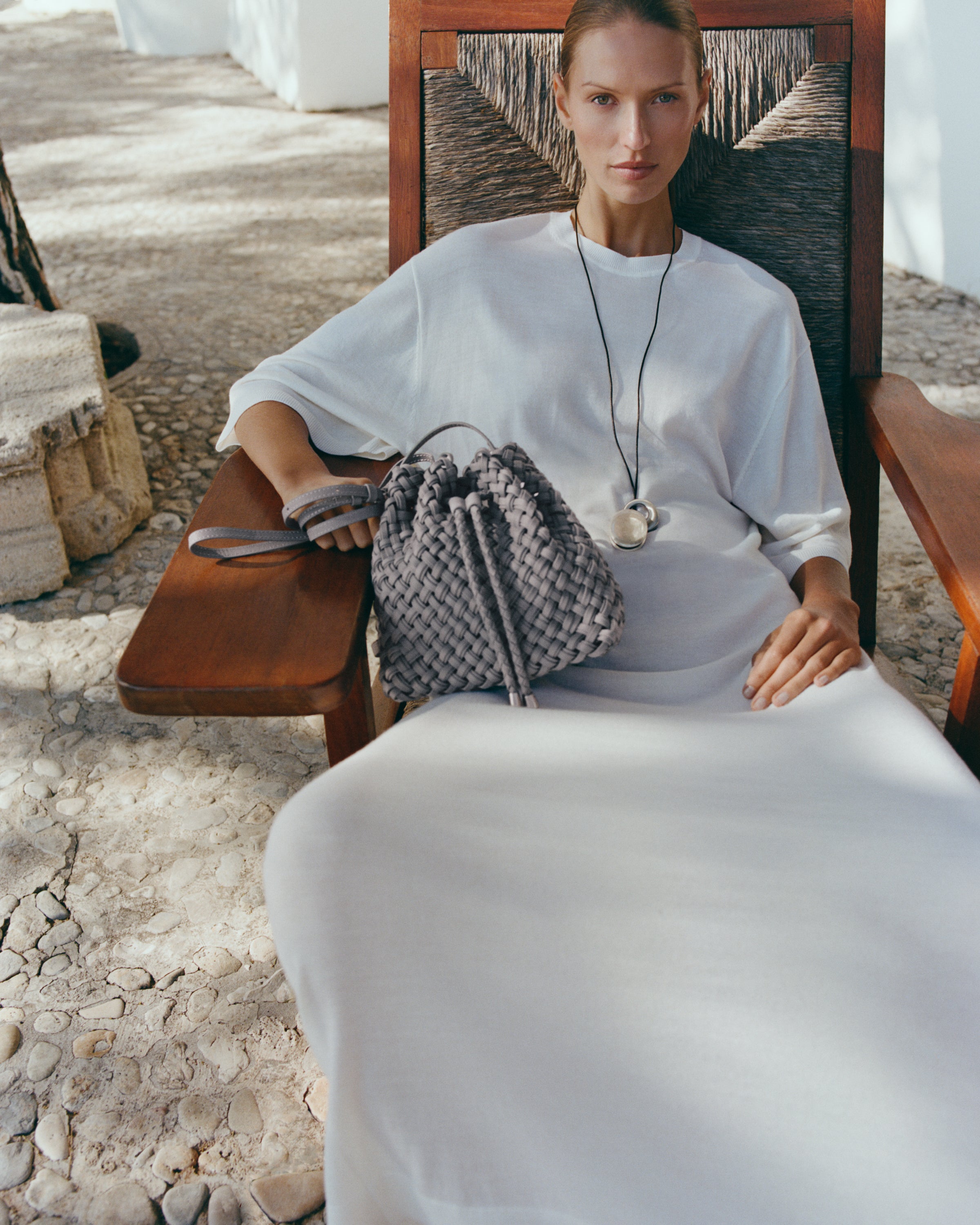 Gramercy Bucket in Marina shown on model to illustrate scale and soft silhouette.
