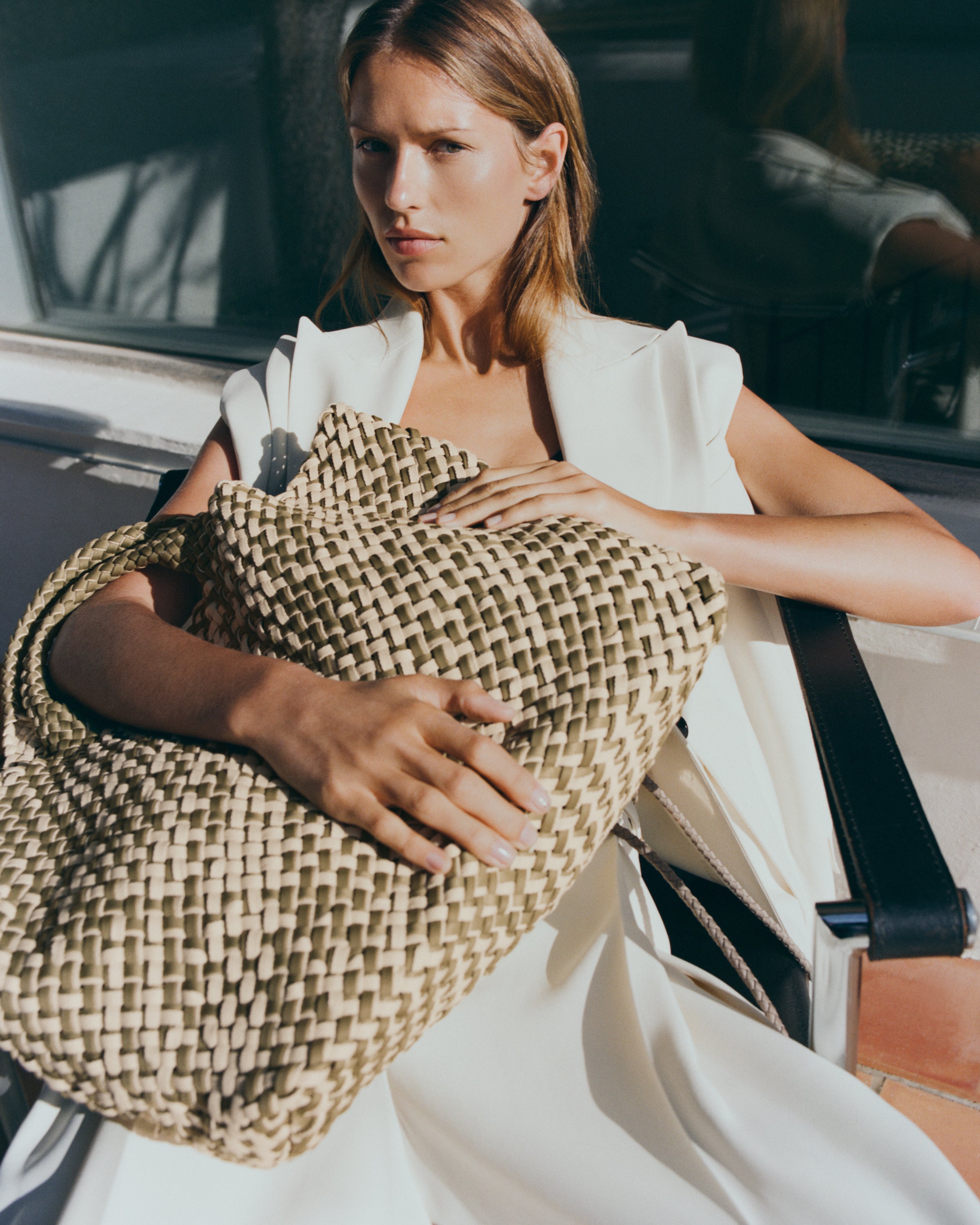 St. Barths Tote in Oletta shown on model to illustrate scale and soft silhouette.