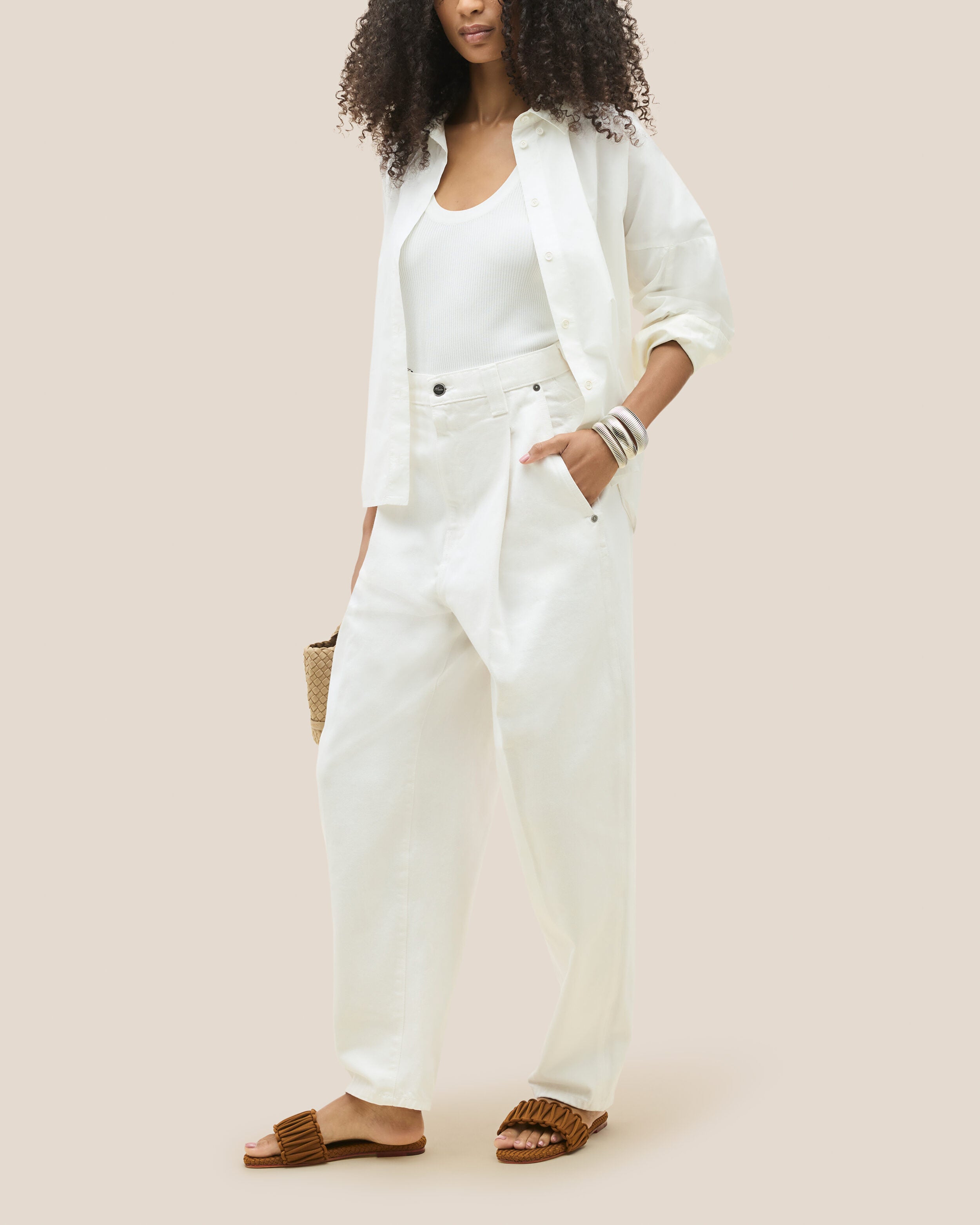 The Athens Slide in Teak shown on model.