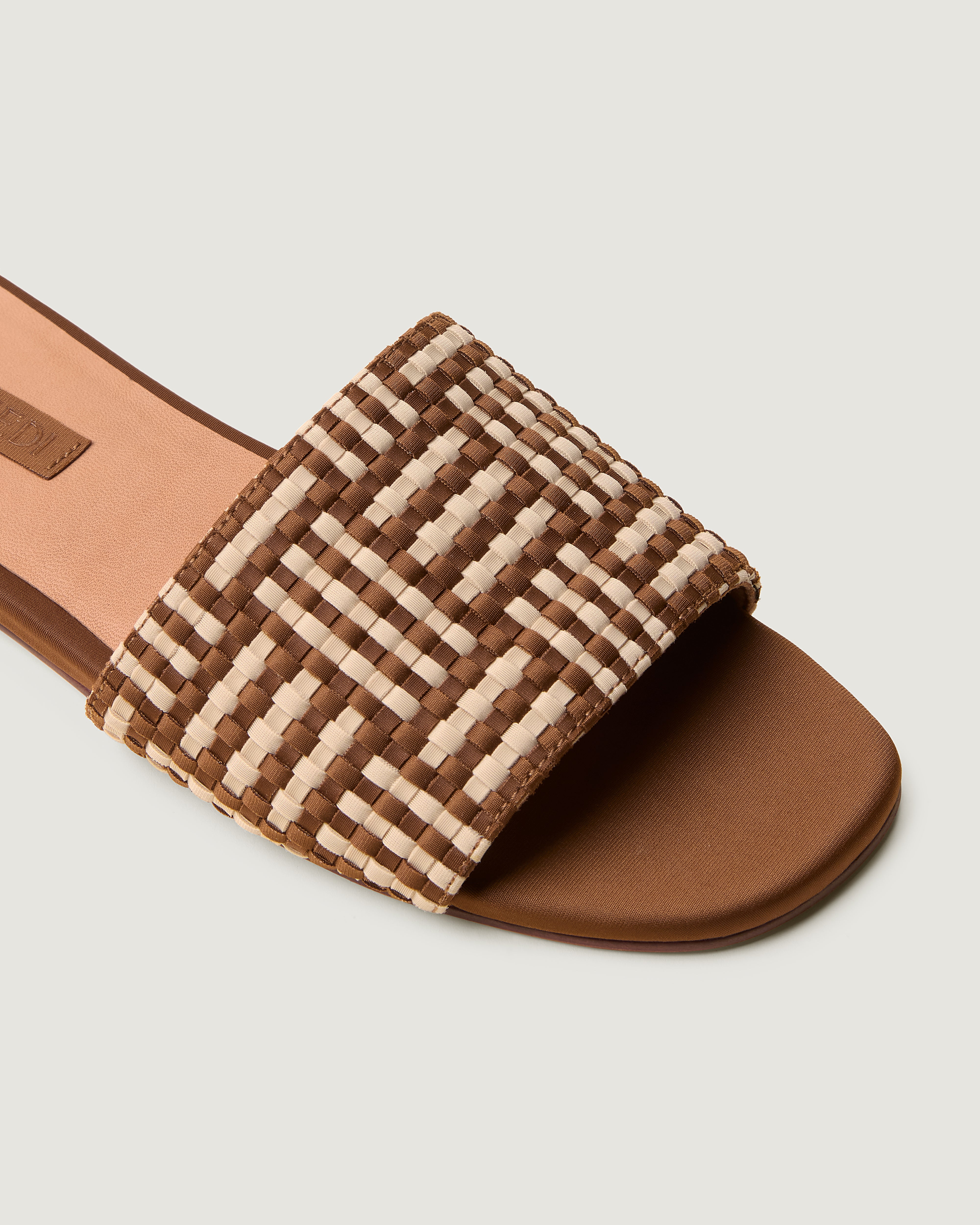 Close-up of Cairo Slide in Almond showing its open toe and square 