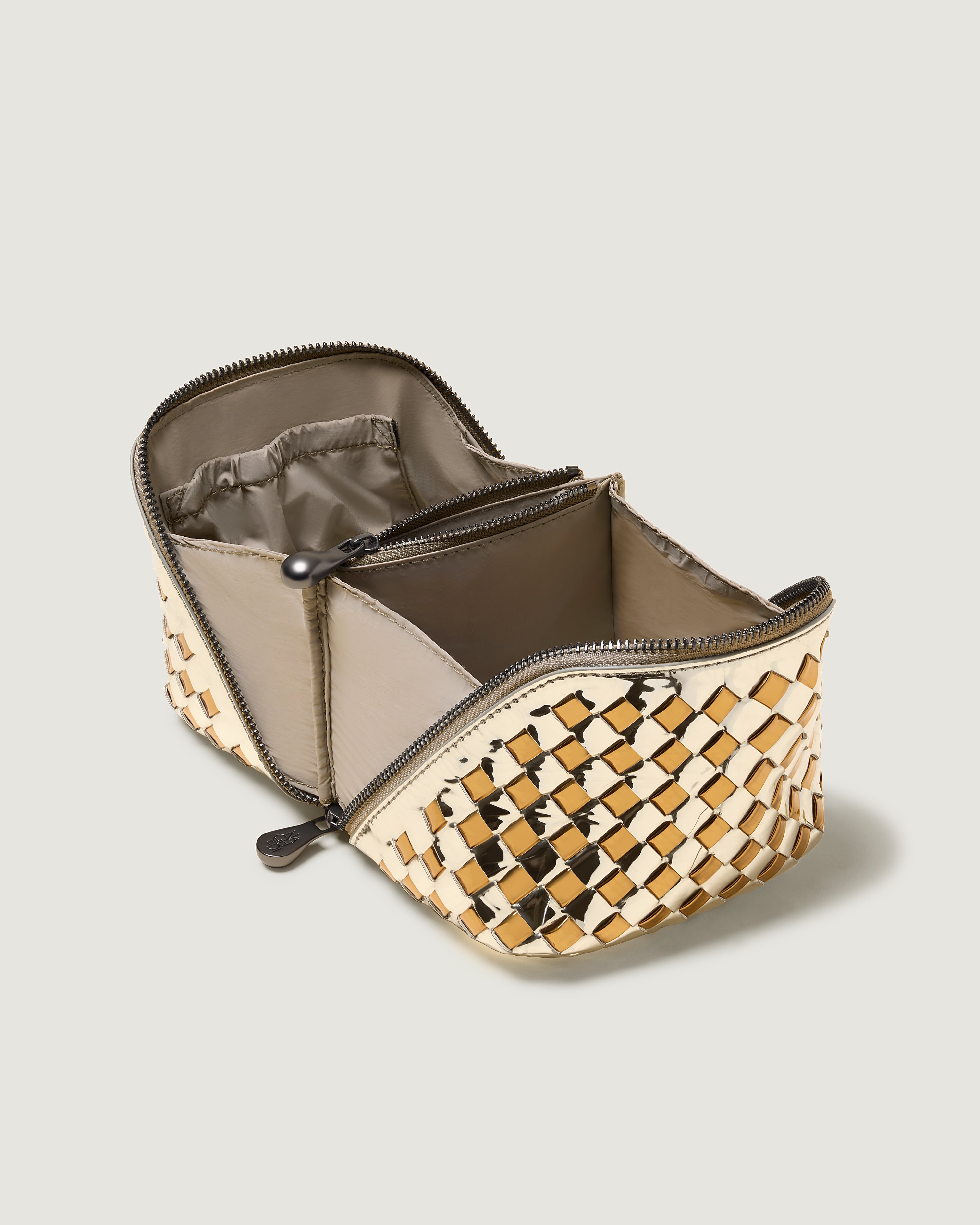 Interior close-up of Caravan Cosmetic Case in Biarritz showing its wrap-around zip closure, and wipe-clean nylon interior.