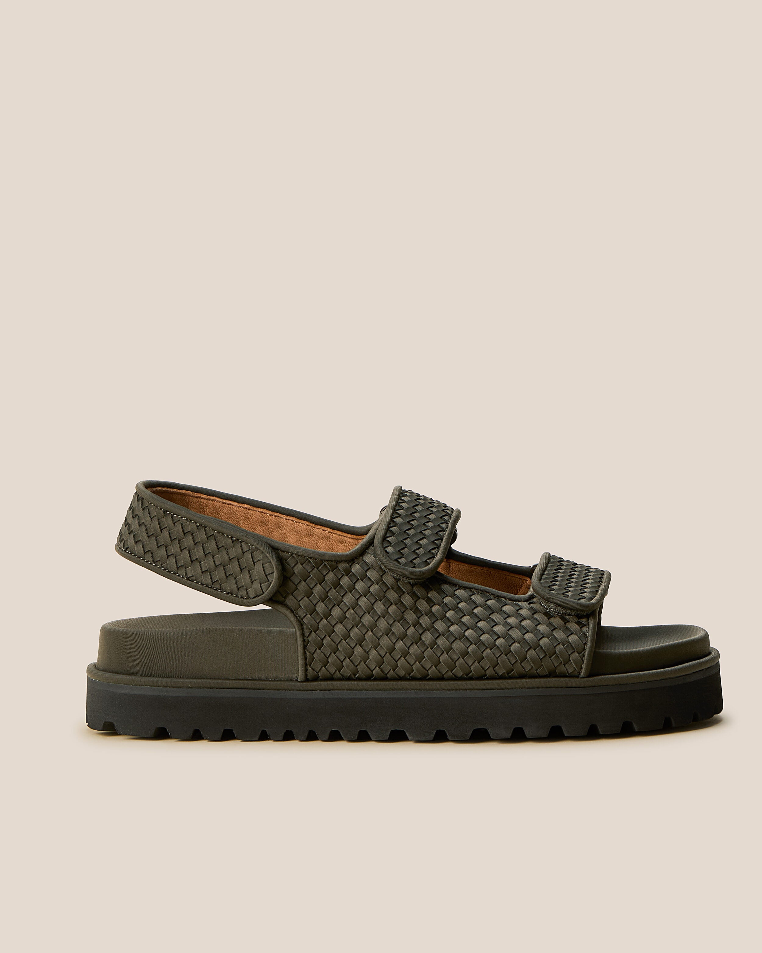 Side view of The Catalina Sandal in Olive, an olive green tone, featuring an open toe and square silhouette, featuring a 3-strap sandal.