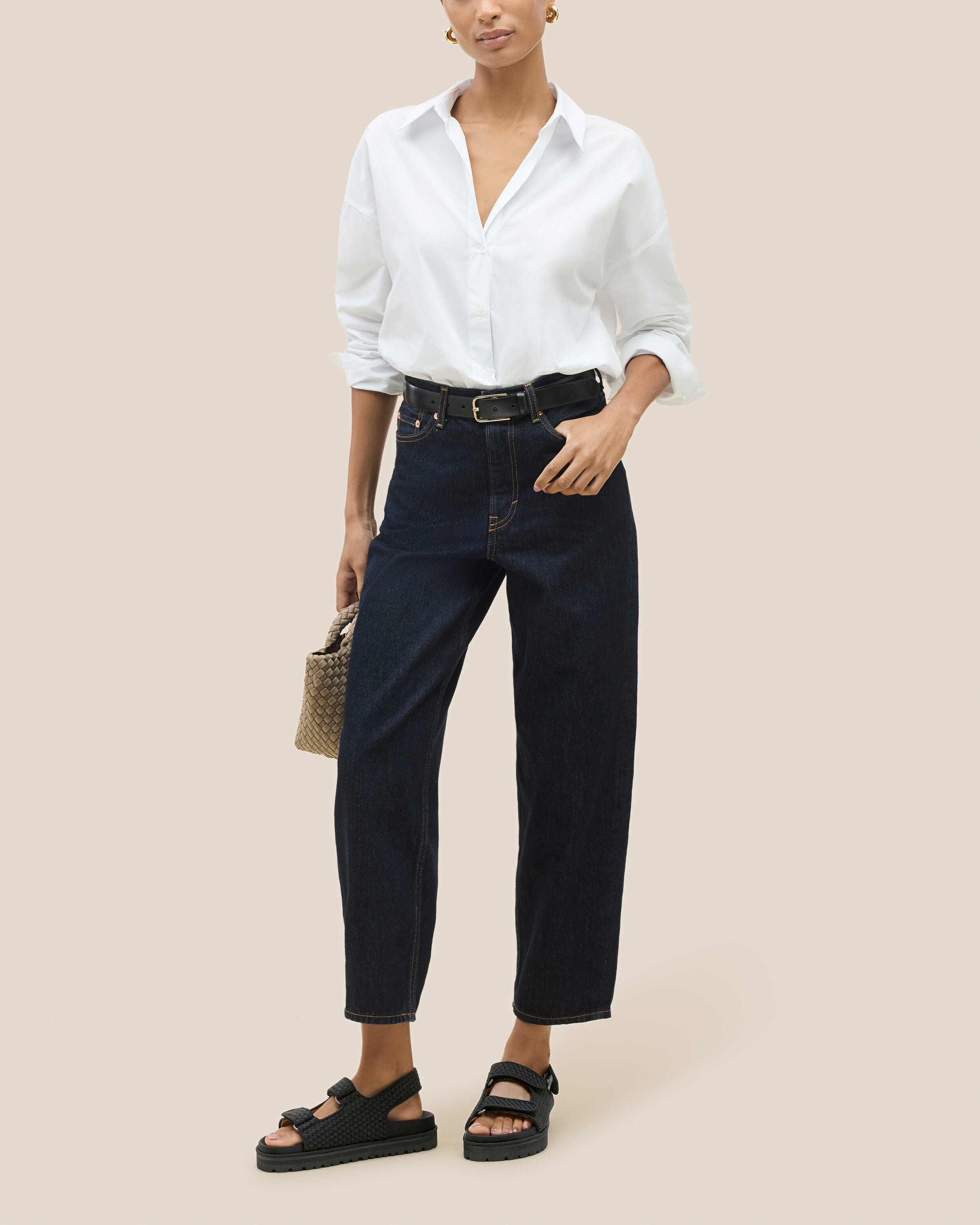 The Catalina Sandal in Onyx shown on model.